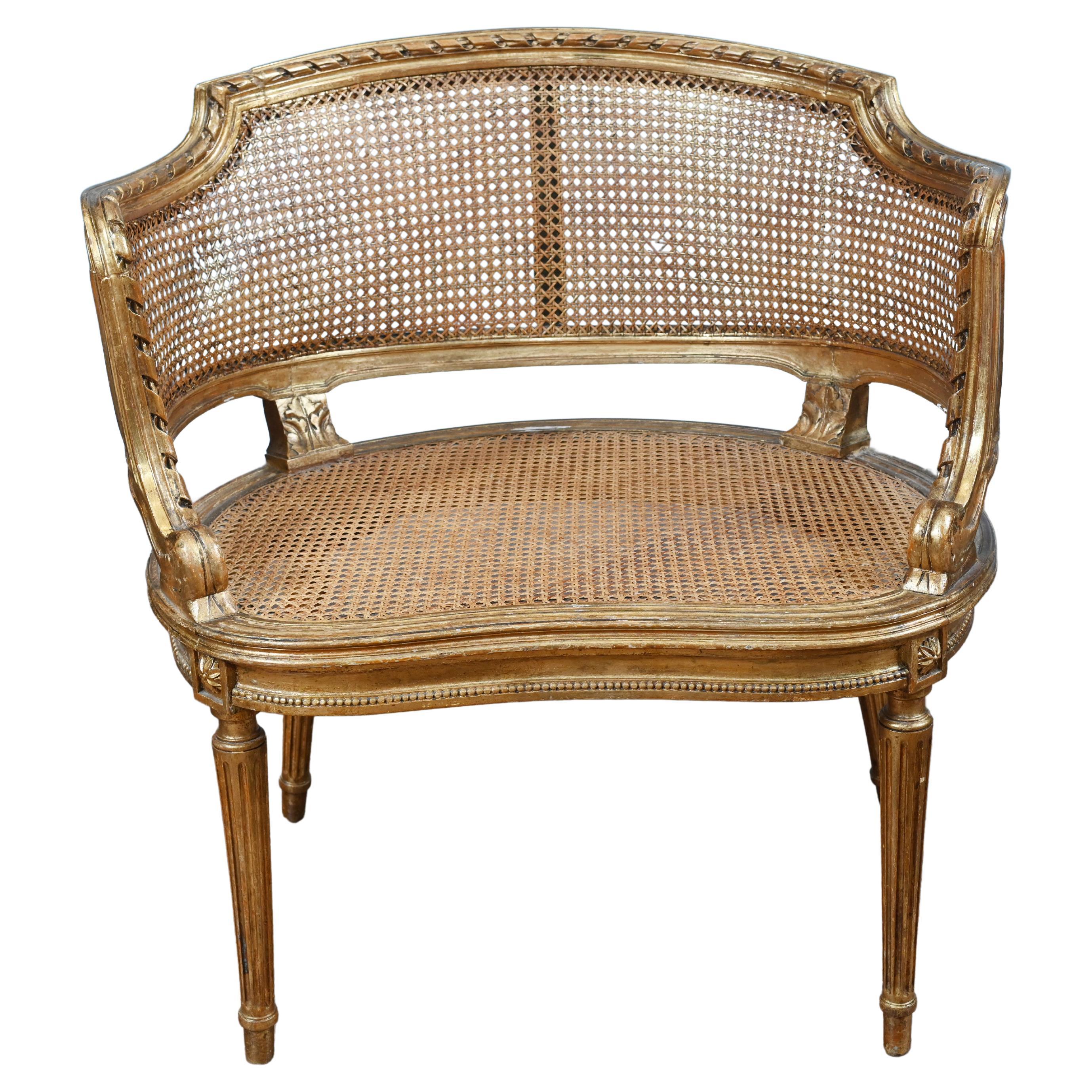 Chaise à accoudoirs en bergère cannée dorée Salon 1880 Louis XVI