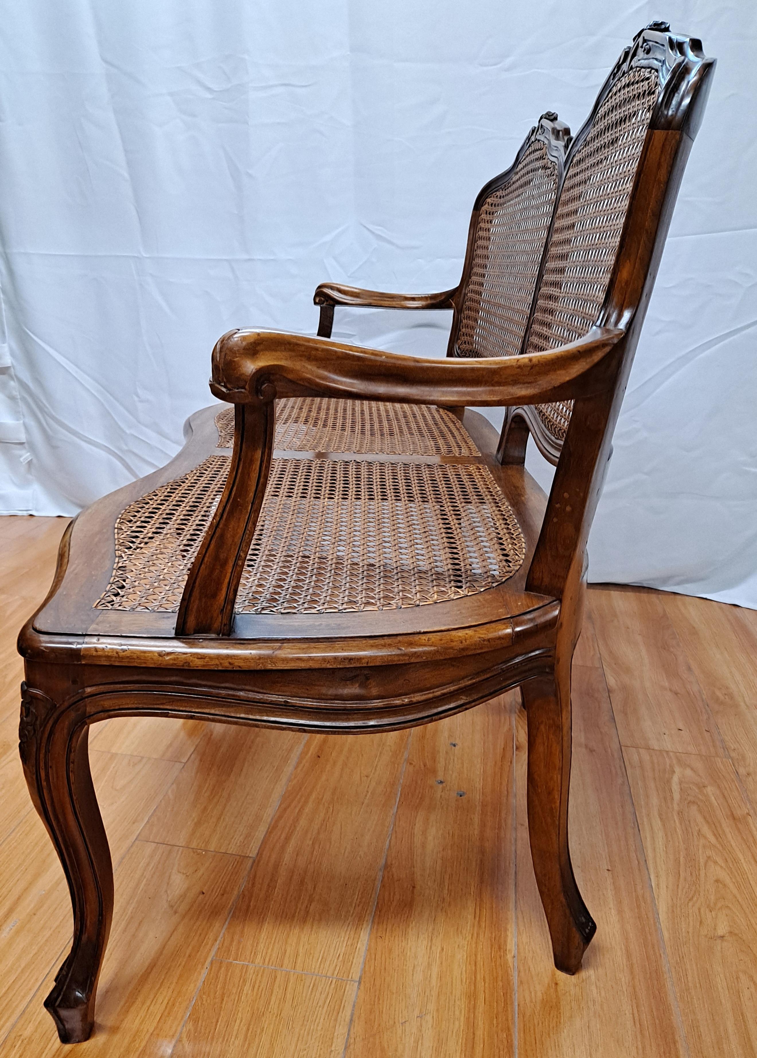 French Provincial French Caned Carved Walnut Bench For Sale