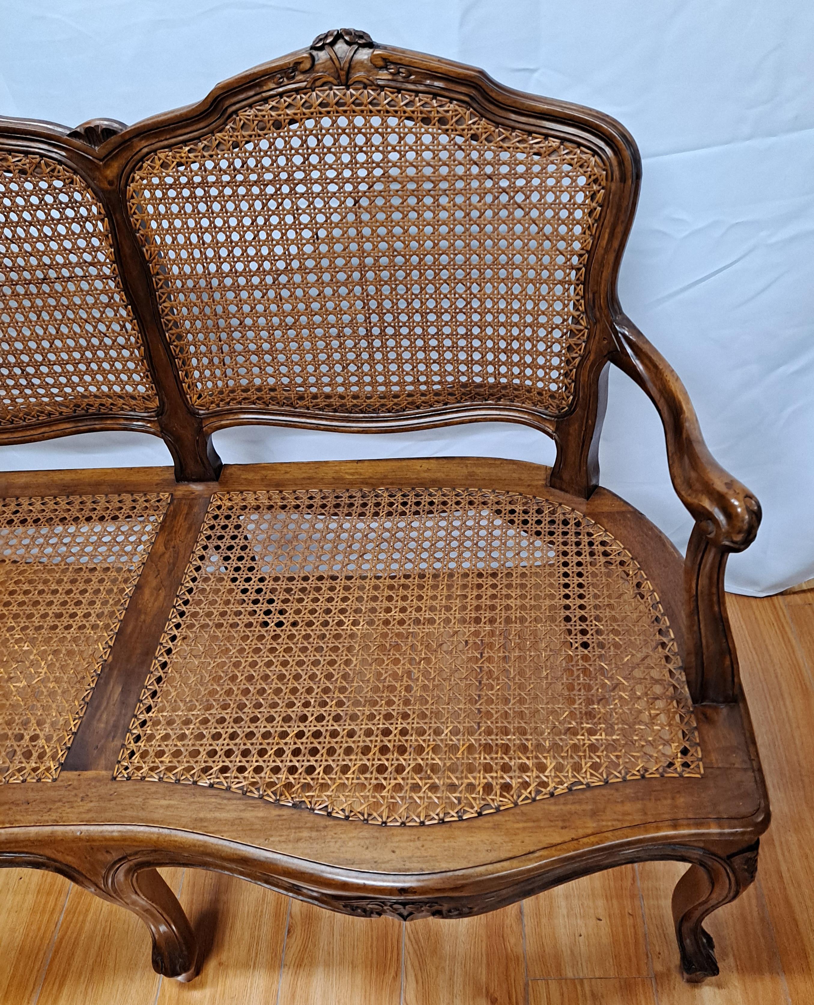 French Caned Carved Walnut Bench In Good Condition For Sale In San Francisco, CA