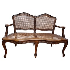 Used French Caned Carved Walnut Bench
