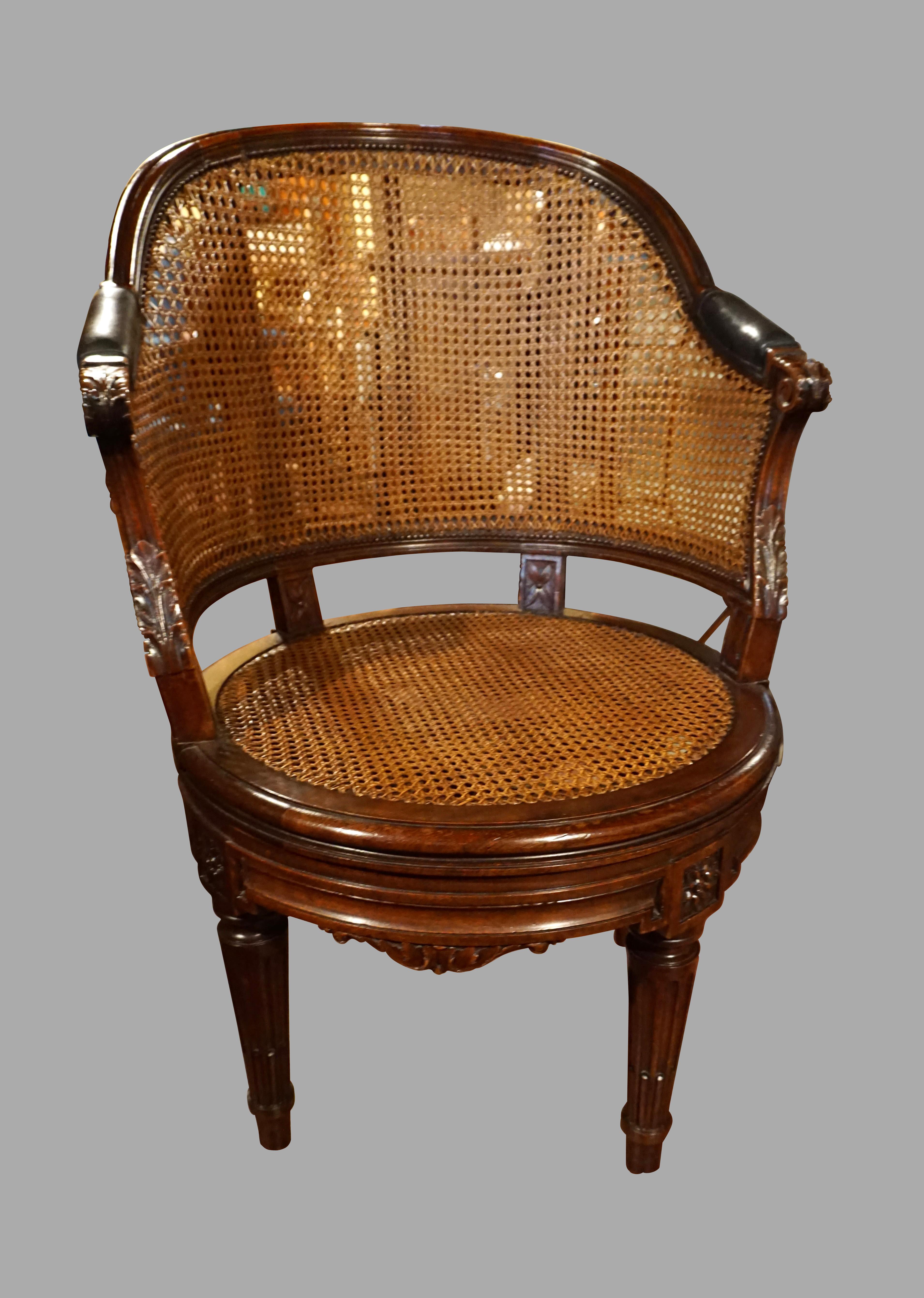 French Caned Louis XVI Style Carved Walnut Swivel Desk Chair with Leather Seat In Good Condition In San Francisco, CA