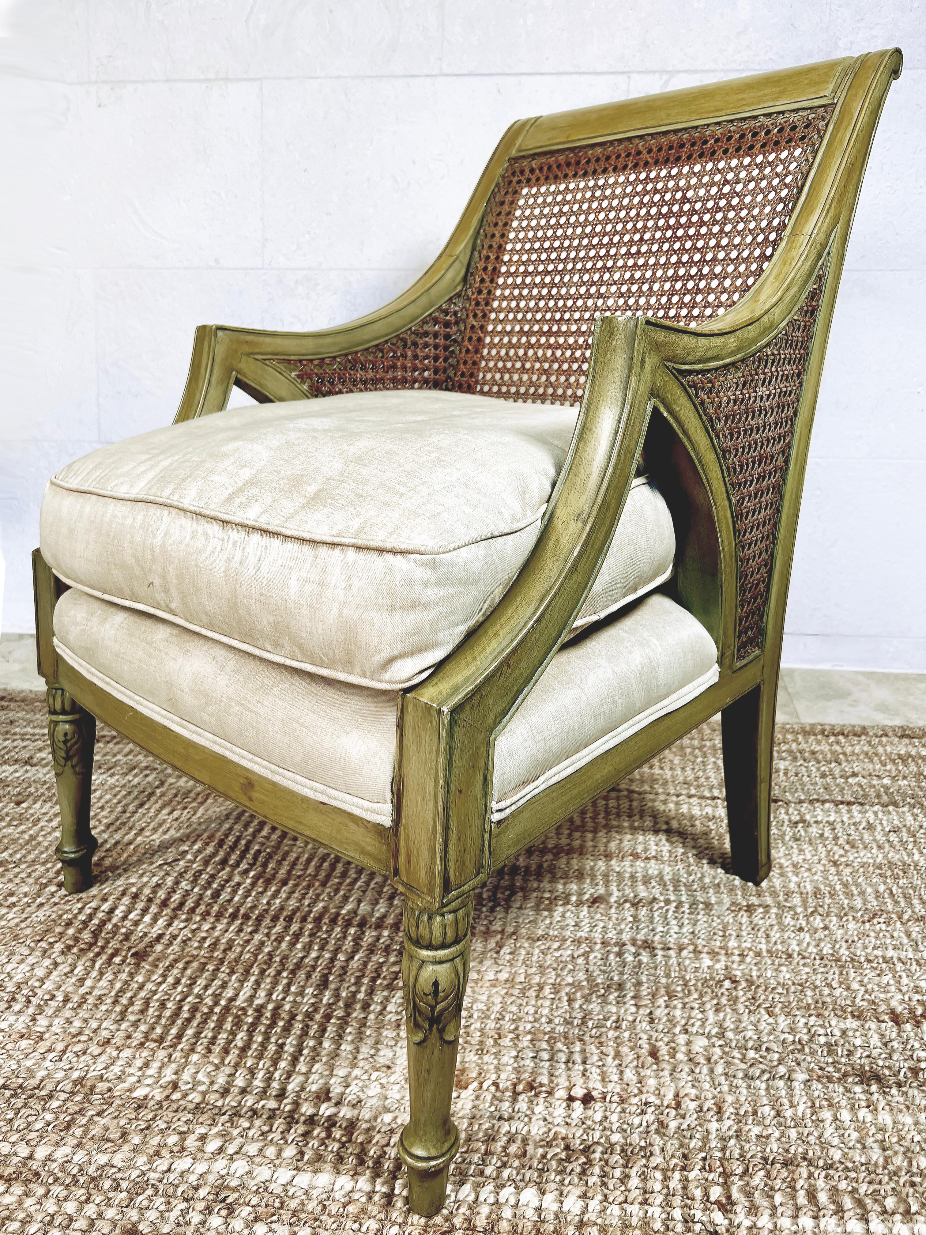 French Caned & Painted Louis XVI Bergere Chairs, Loose Seat Cushions PR

Offered for sale is a pair of French caned and painted wood Louis XVI style  bergere chairs with loose seat cushion.  These chairs are in good vintage condition with two areas