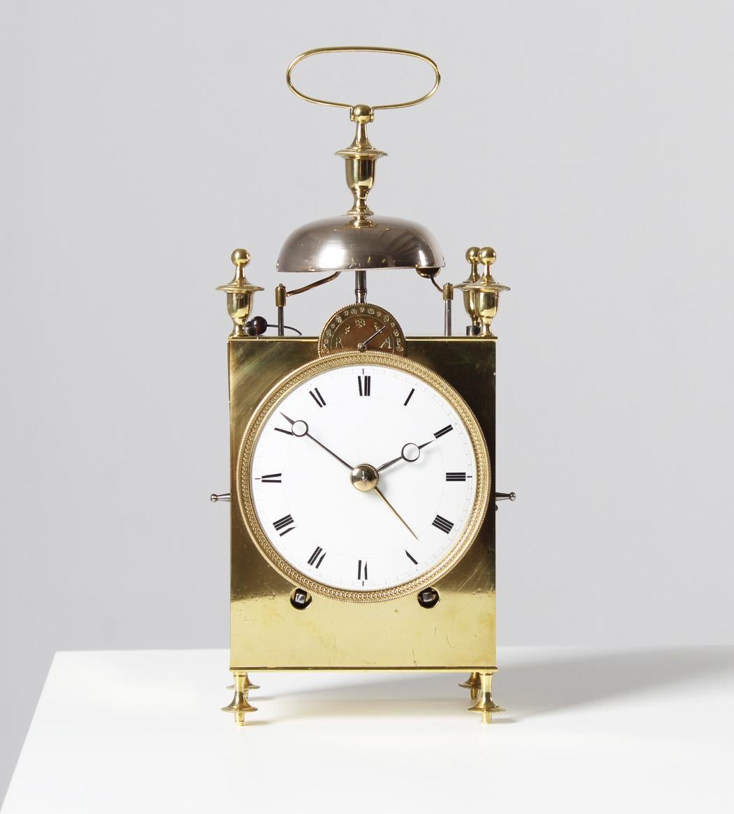 Antique Capucine travel clock

France
Brass, enamel
circa 1800

Dimensions: H x W x D: 29 x 12 x 8 cm

Description:
Antique travelling clock of the 
