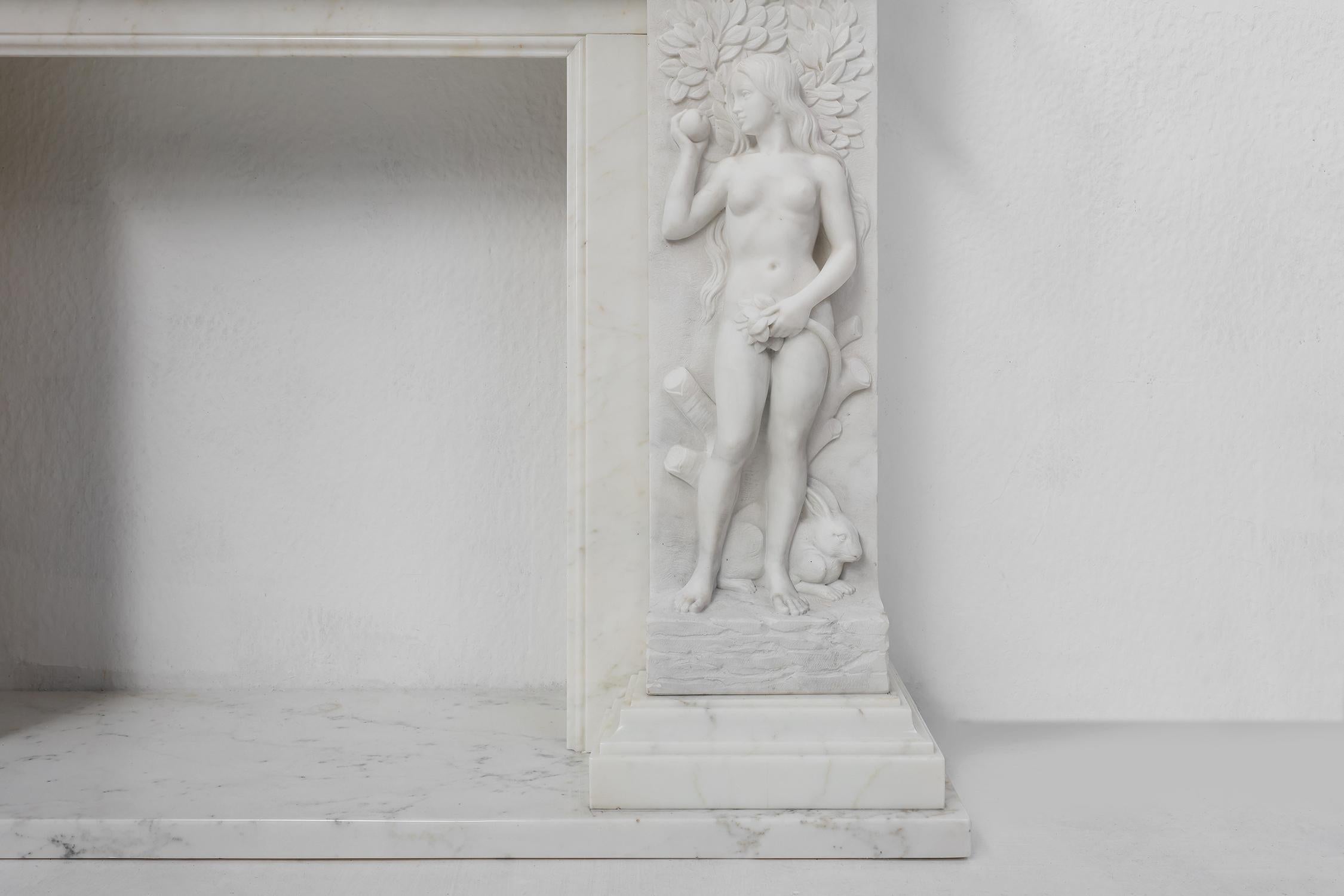 Carved French Carrara marble fire place with Adam and Eve decoration For Sale