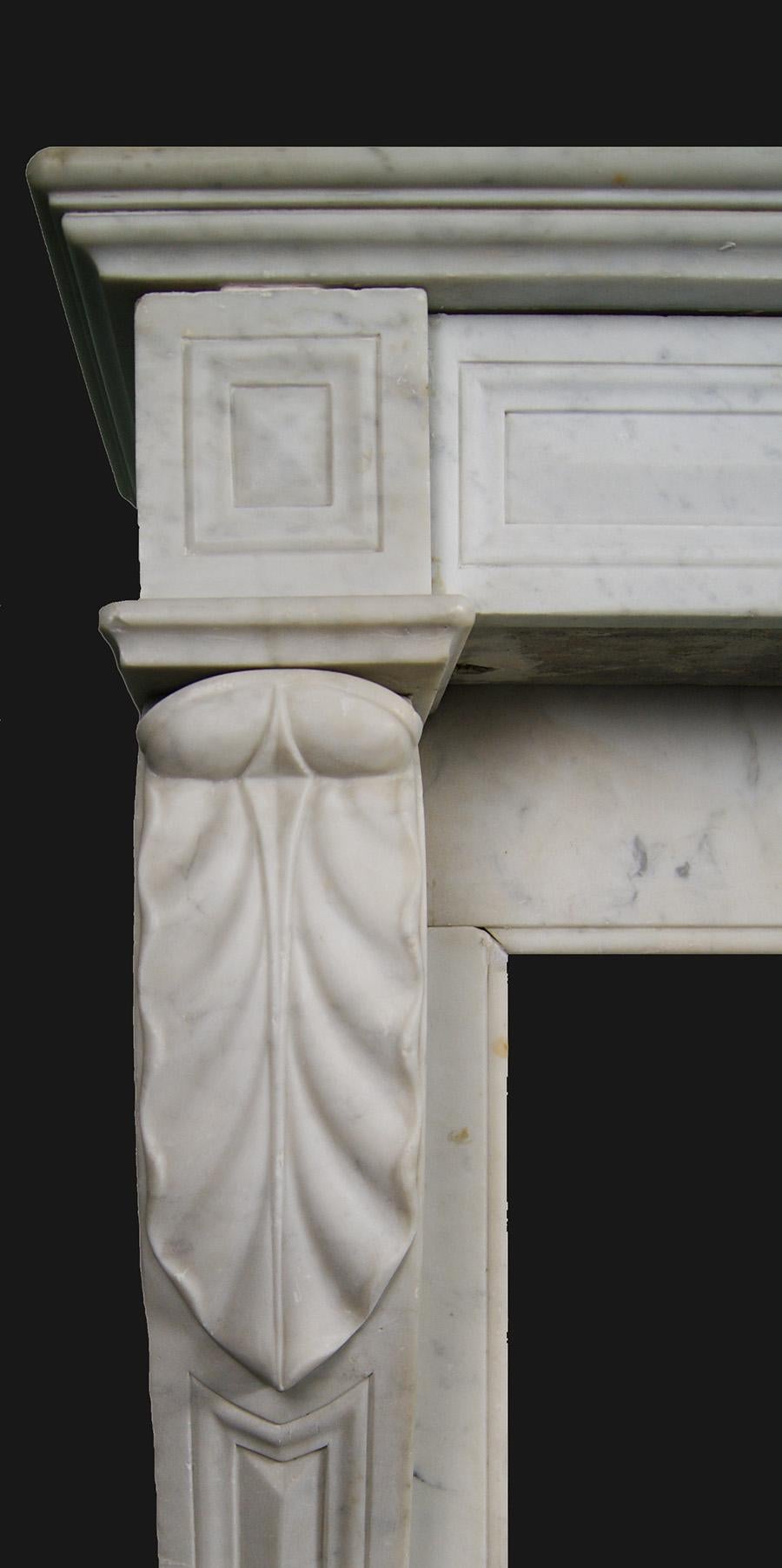 Carved French Carrara Marble Fireplace in the Louis XVI Manner For Sale
