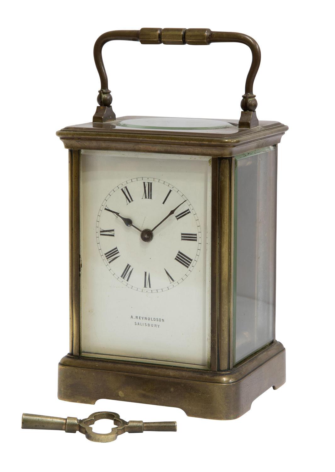 A large French carriage clock timepiece with enamel dial retailed by A. Reynoldson, Salisbury,

circa 1900.