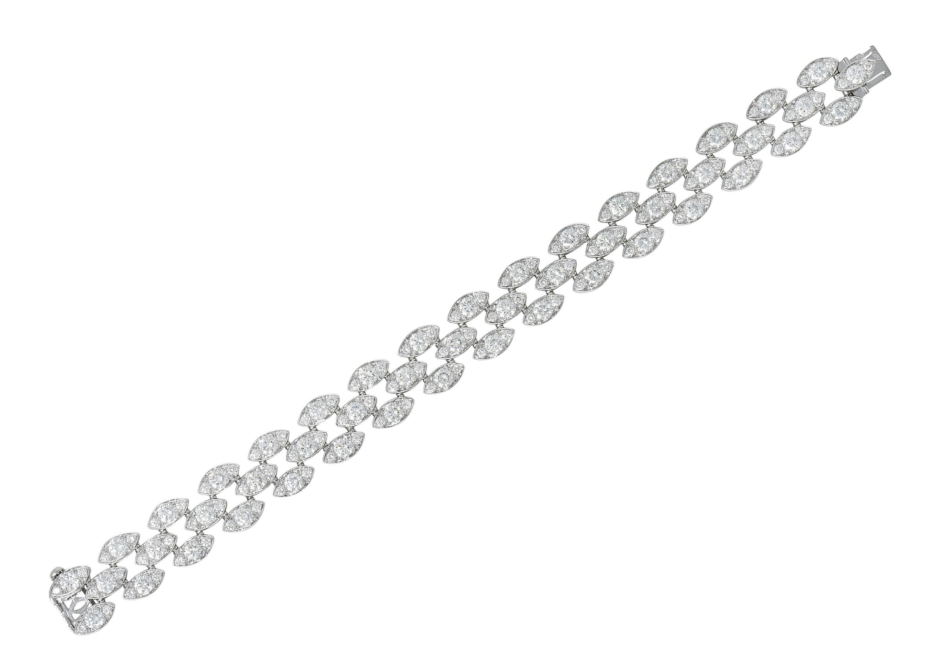 Line bracelet is comprised of three rows of navette shaped links

Each bead set with a trio of round brilliant cut diamonds

Weighing in total approximately 11.04 carats with G to I color and VS clarity

Completed by a concealed clasp with a