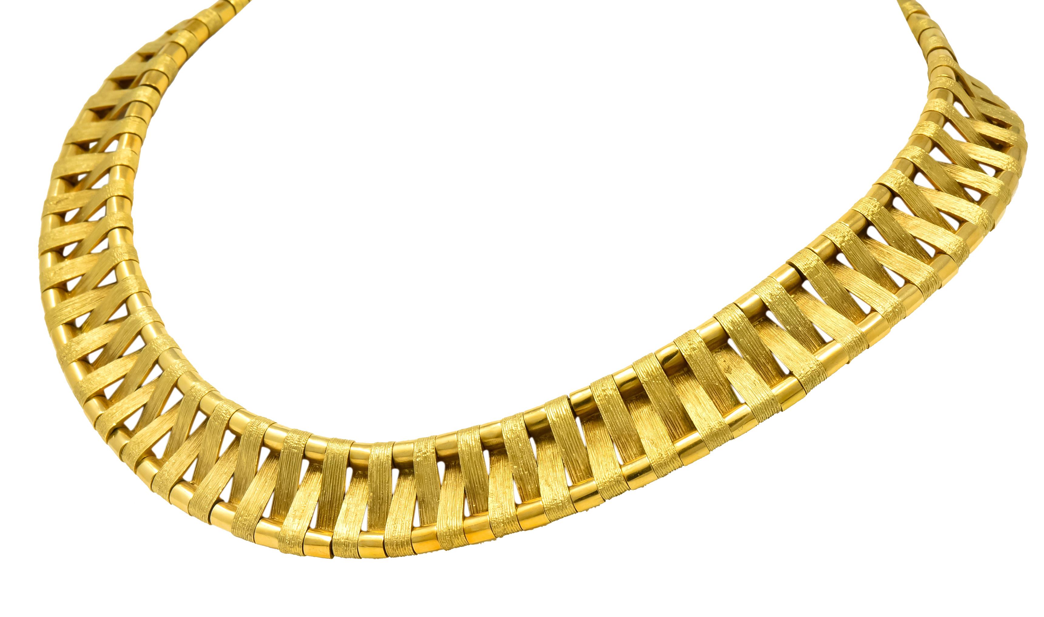 Necklace designed as textured bar links, alternating in depth, in a woven motif

With polished gold spacer links

Strung on gold wheat chain completed by concealed clasp

Fully signed Cartier and numbered with French assay mark for 18 karat