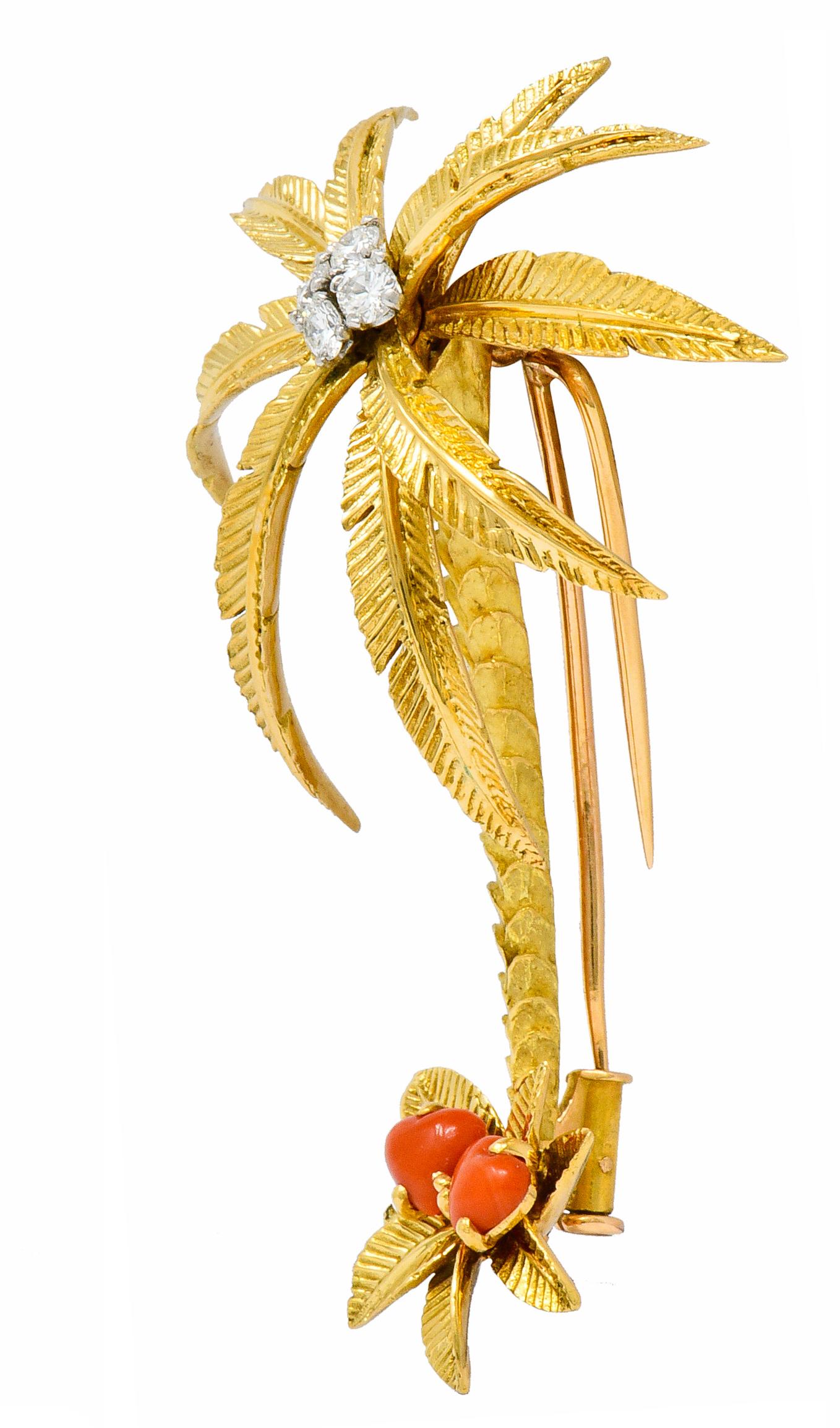 Brooch is designed as a palm tree with layered and radiating leaves

Bark of trunk is matte gold with dynamically tiered texture while leaves are brightly polished and engraved

Top of tree features a cluster of round brilliant cut diamonds weighing