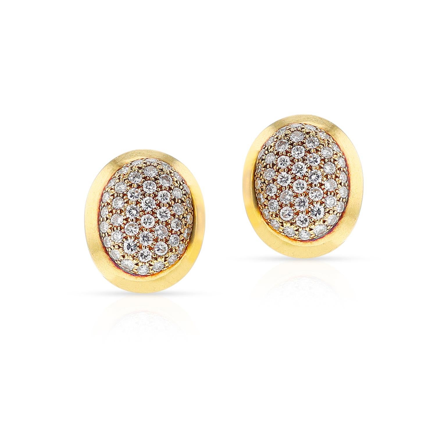 A pair of French Cartier Oval Diamond Earrings made in 18k Yellow Gold. The total weight of the diamonds is 1.80 carats. The clarity is VVS2, VS1, and Color is F/G. Signed and Numbered. French Marks. The dimensions are 0.72 inches x 0.61 inches. The