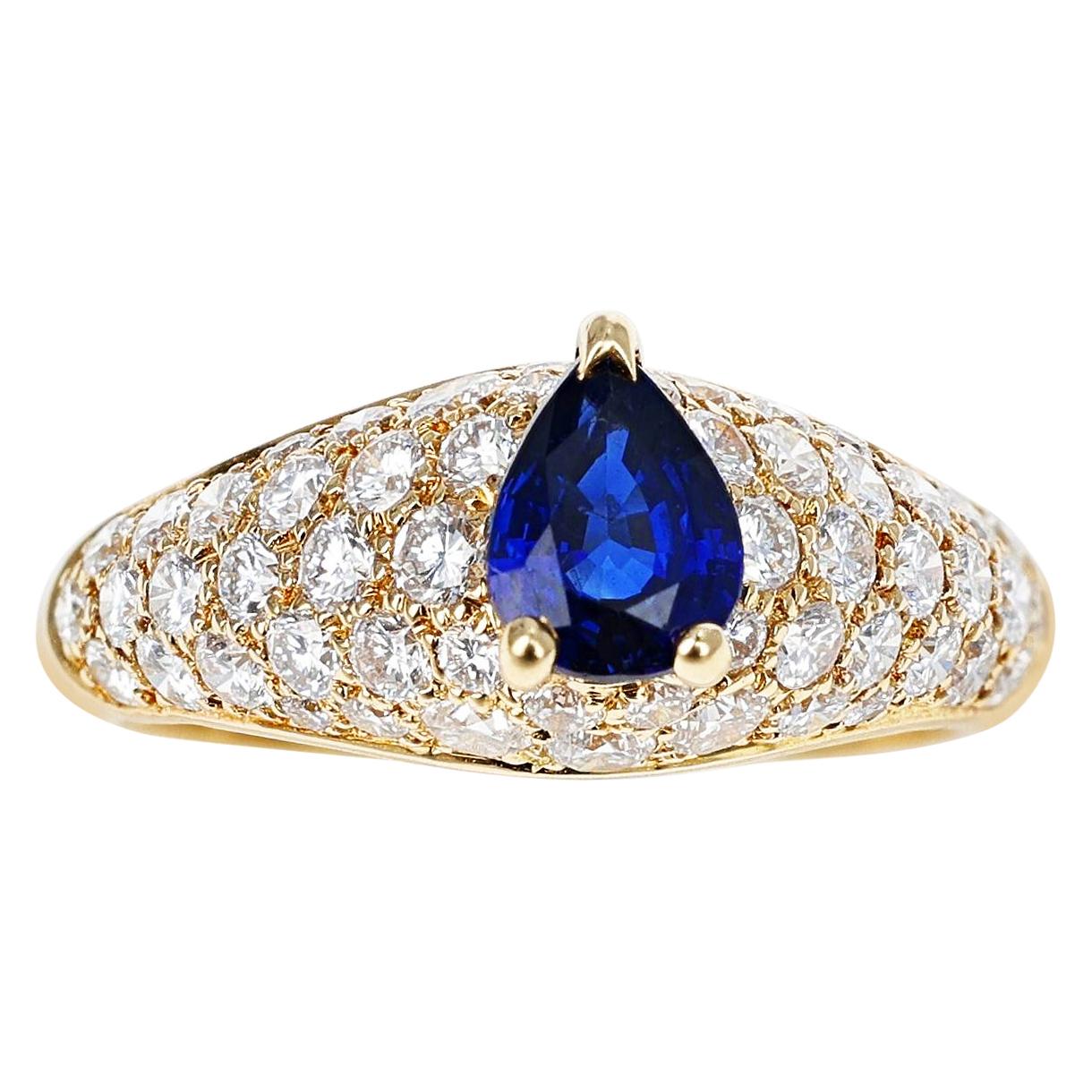Französischer Cartier Ring aus 18 Karat Gelbgold mit blauem Saphir in Birnenform und Diamanten