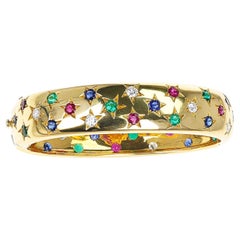 French Cartier Star Bangle with Ruby, Emerald, Sapphire, and Diamond Bangle, 18K