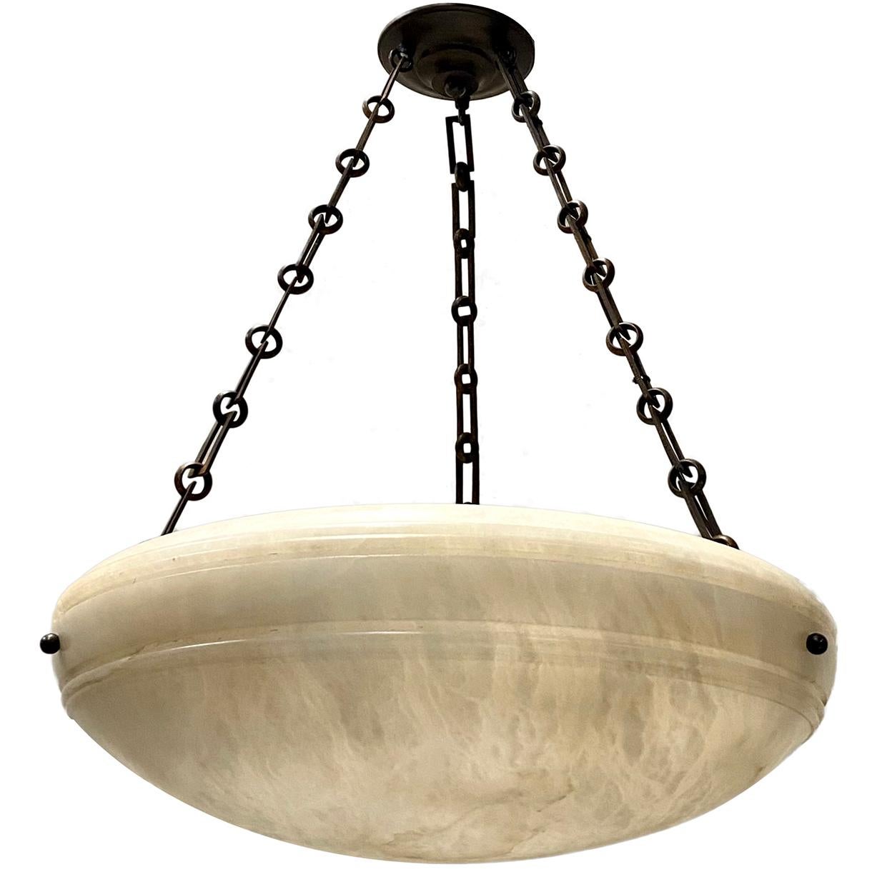 A circa 1950's French carved alabaster light fixture.

Measurements:
diameter: 23