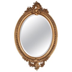 French Carved and Gilded Oval Mirror
