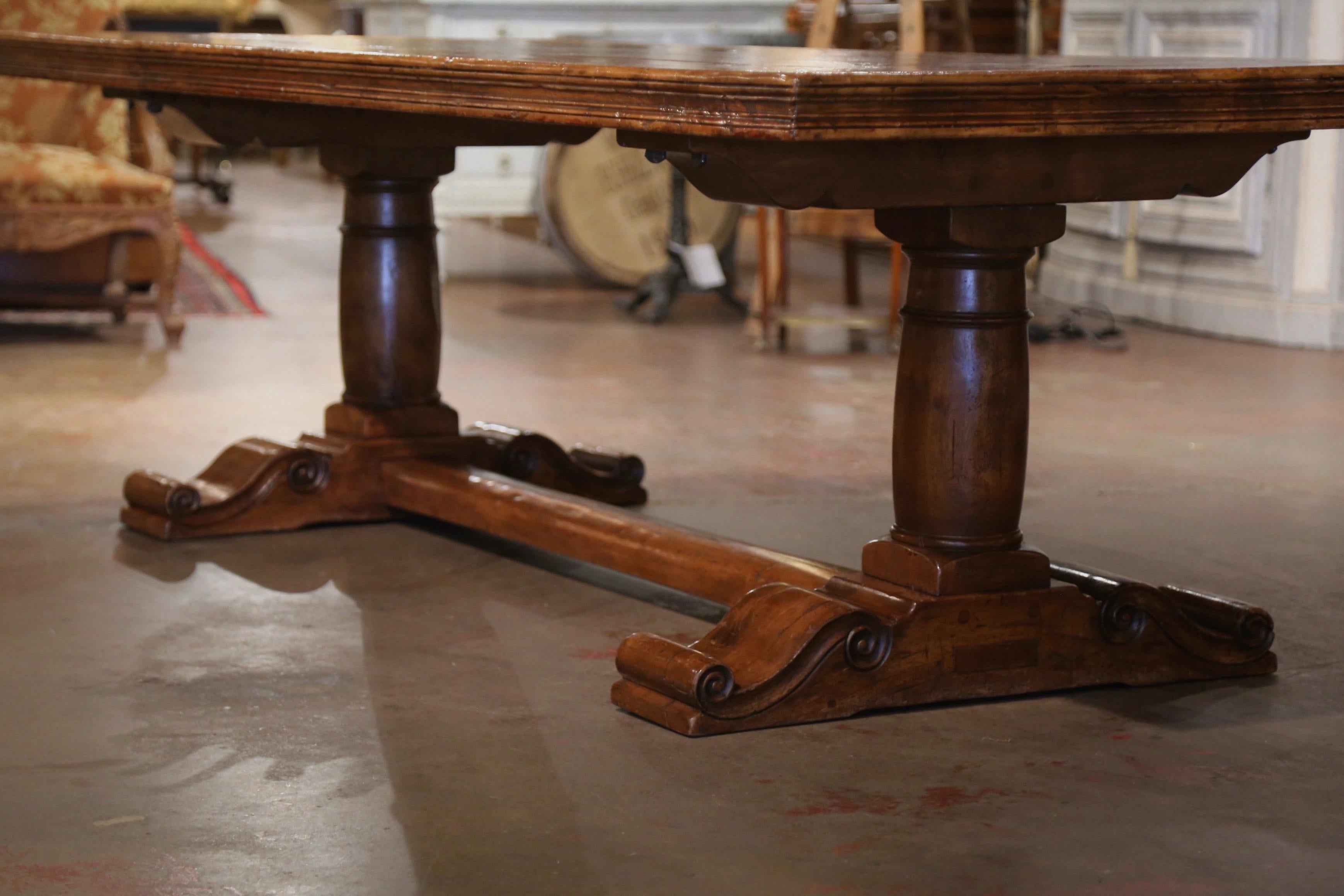  French Carved Antique Walnut & Elm Trestle Dining Table with Fleur de Lys Decor For Sale 4