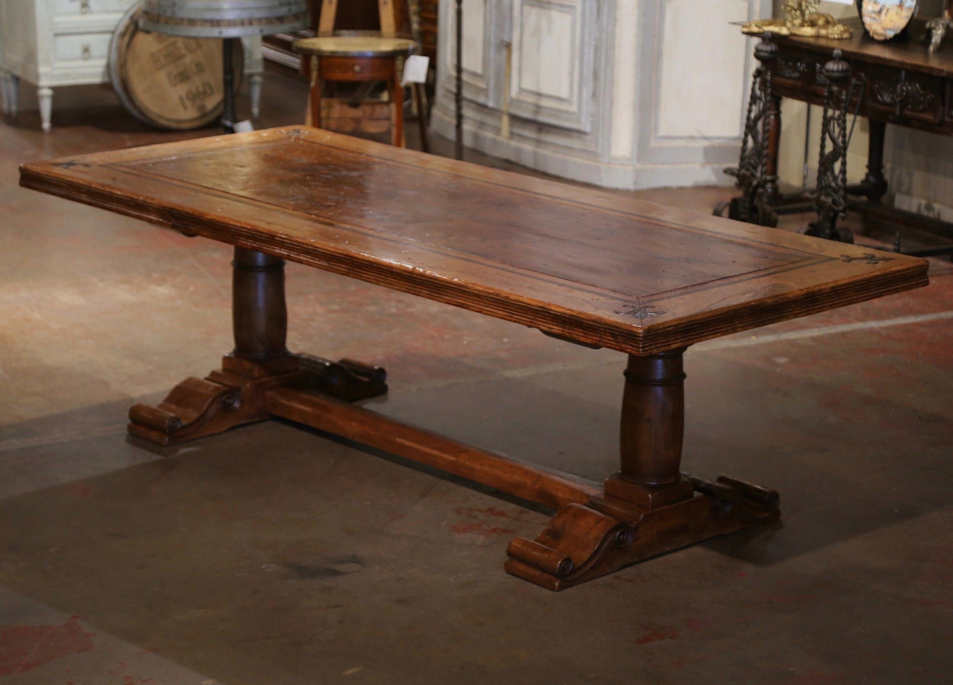  French Carved Antique Walnut & Elm Trestle Dining Table with Fleur de Lys Decor In Excellent Condition For Sale In Dallas, TX