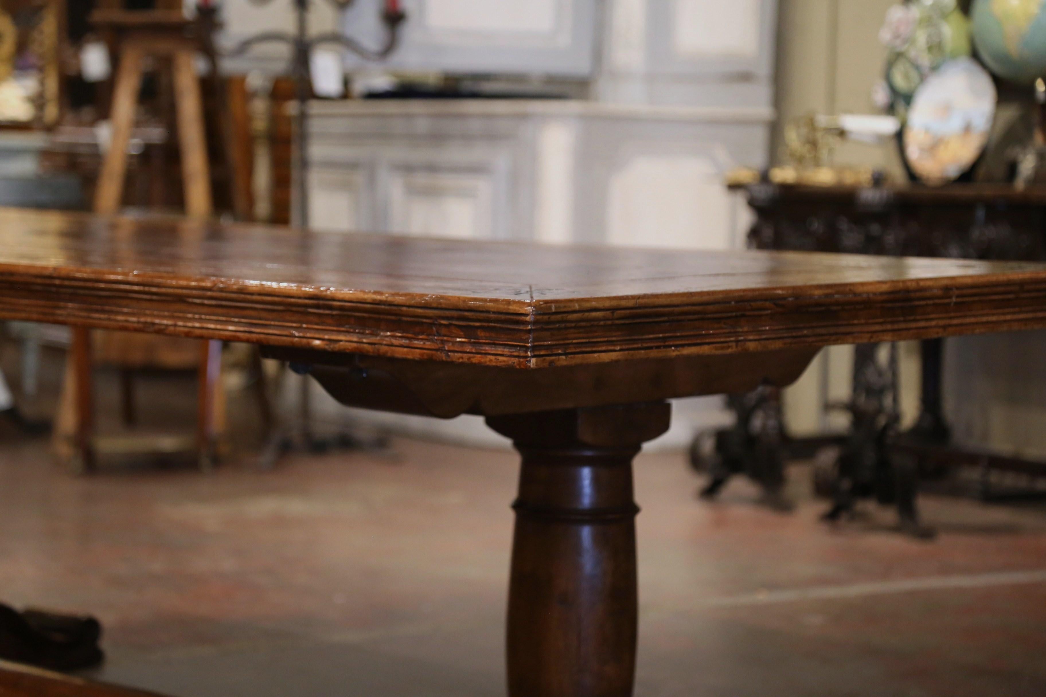  French Carved Antique Walnut & Elm Trestle Dining Table with Fleur de Lys Decor For Sale 1