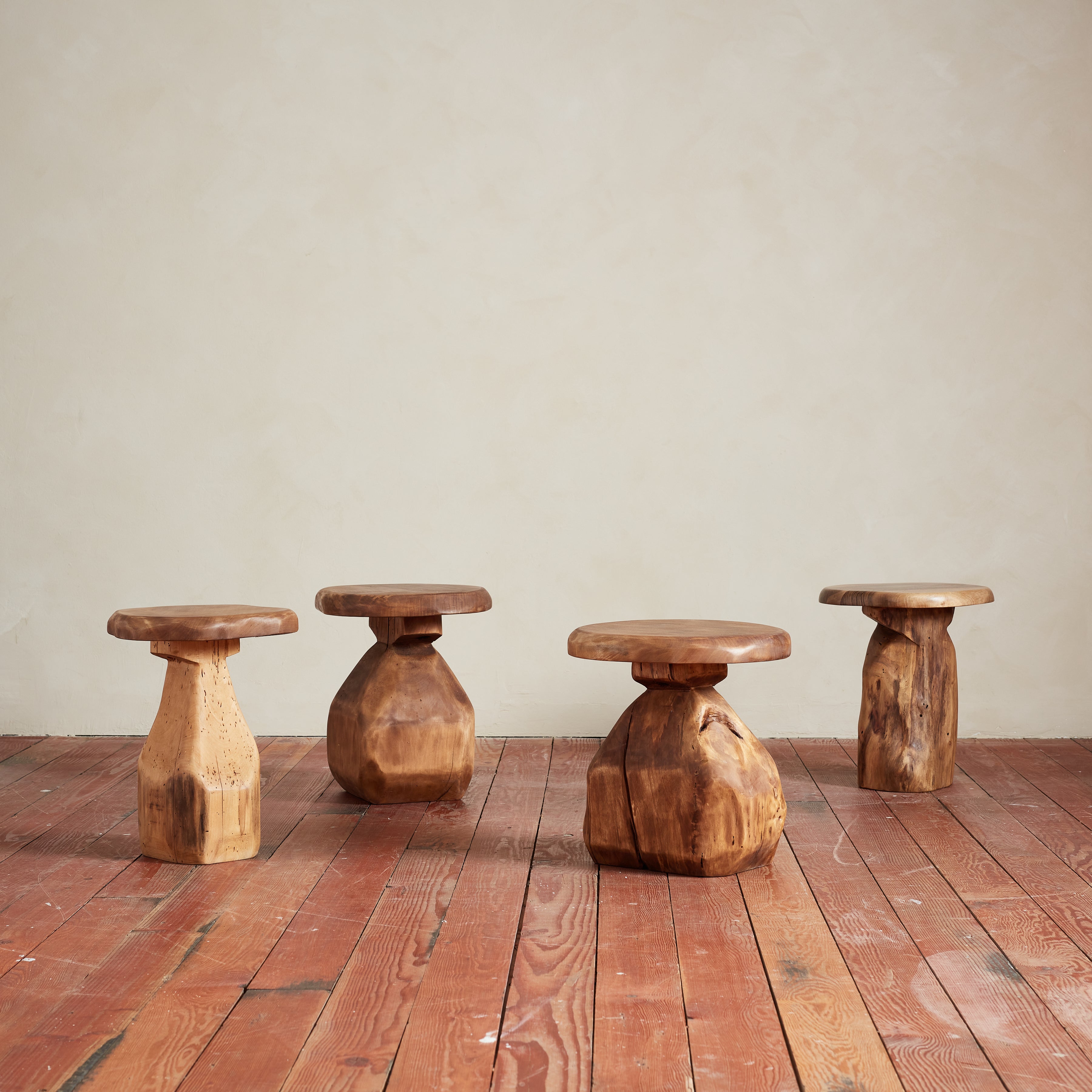 Unique carved stools with beautiful organic shape
Each individually distinct in shape and form 
Wonderful wood grain throughout 

Sold individually 

Measurements from left to right 
1. 19