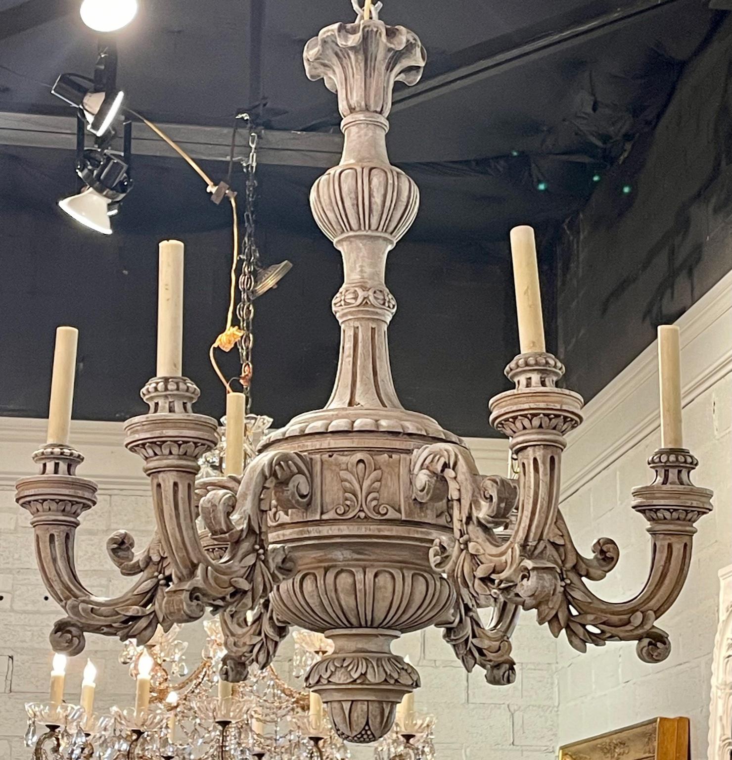 19th century French carved white washed oak 6-light chandelier, Circa 1880. The chandelier has been professionally re-wired, cleaned and is ready to hang. Includes matching chain and canopy. The perfect addition to any home.