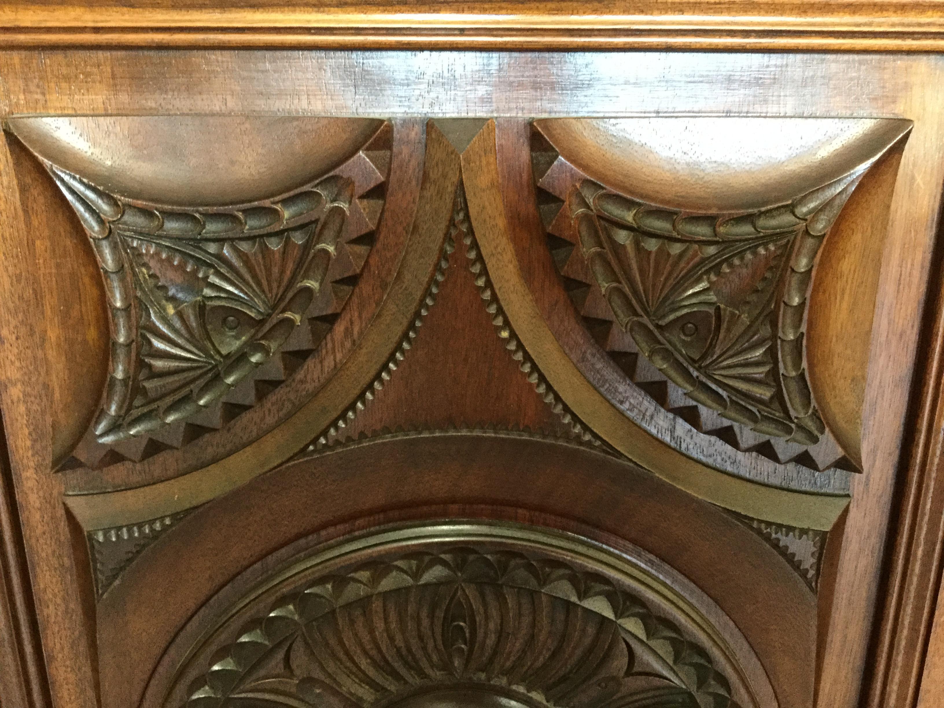 Custom made in France, this armoire/bookcase features exquisite carving over the entire piece.
Reminiscent of the Spanish Renaissance, you will love the warmth and beauty of the chestnut wood. There are 2 doors and an open space for lots of