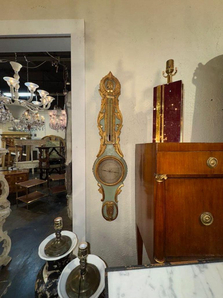 19th century French carved and parcel gilt barometer. Circa 1880. A favorite of top designers. 38H x 10W x 2D