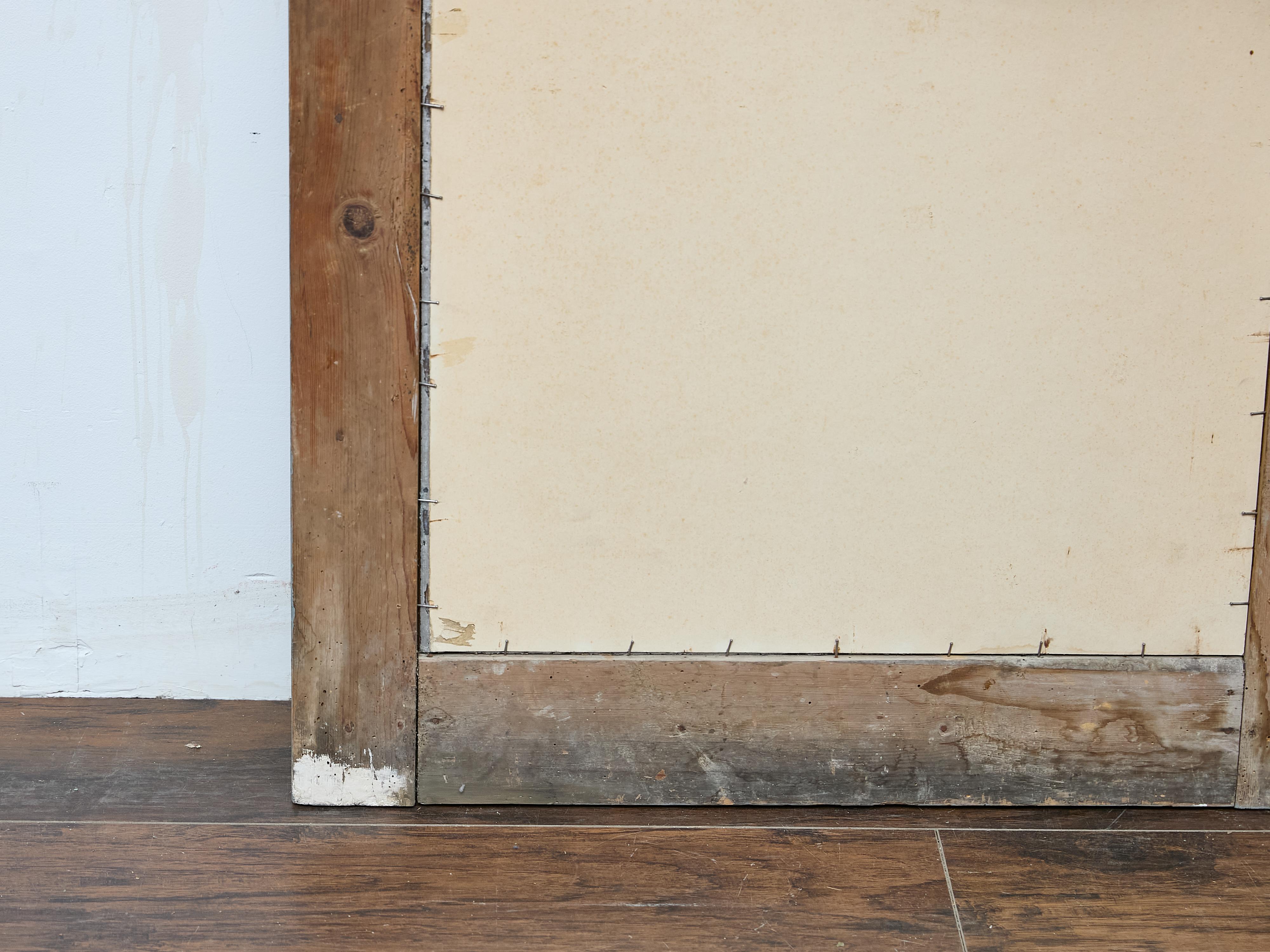 Espejo francés tallado en madera dorada con marco de madera pintada clara, hacia 1920 en venta 8