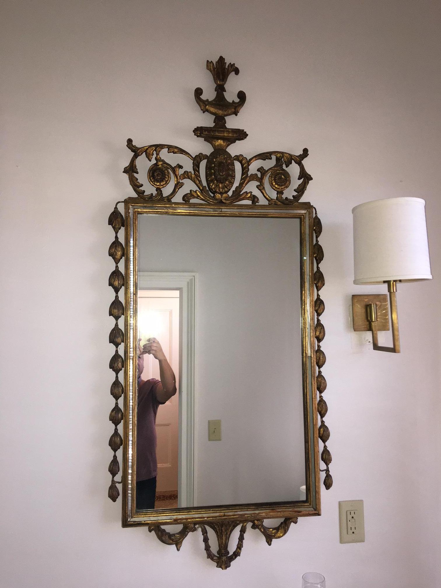 French carved giltwood Regency mirror, mid-20th century.
 