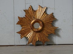 French Carved Giltwood Sunburst Mirror with Cloudy Frame, circa 1930-1940