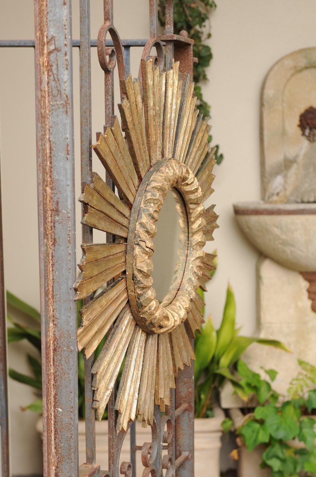 French Carved Giltwood Sunburst Mirror with Cloudy Frame, circa 1950 3