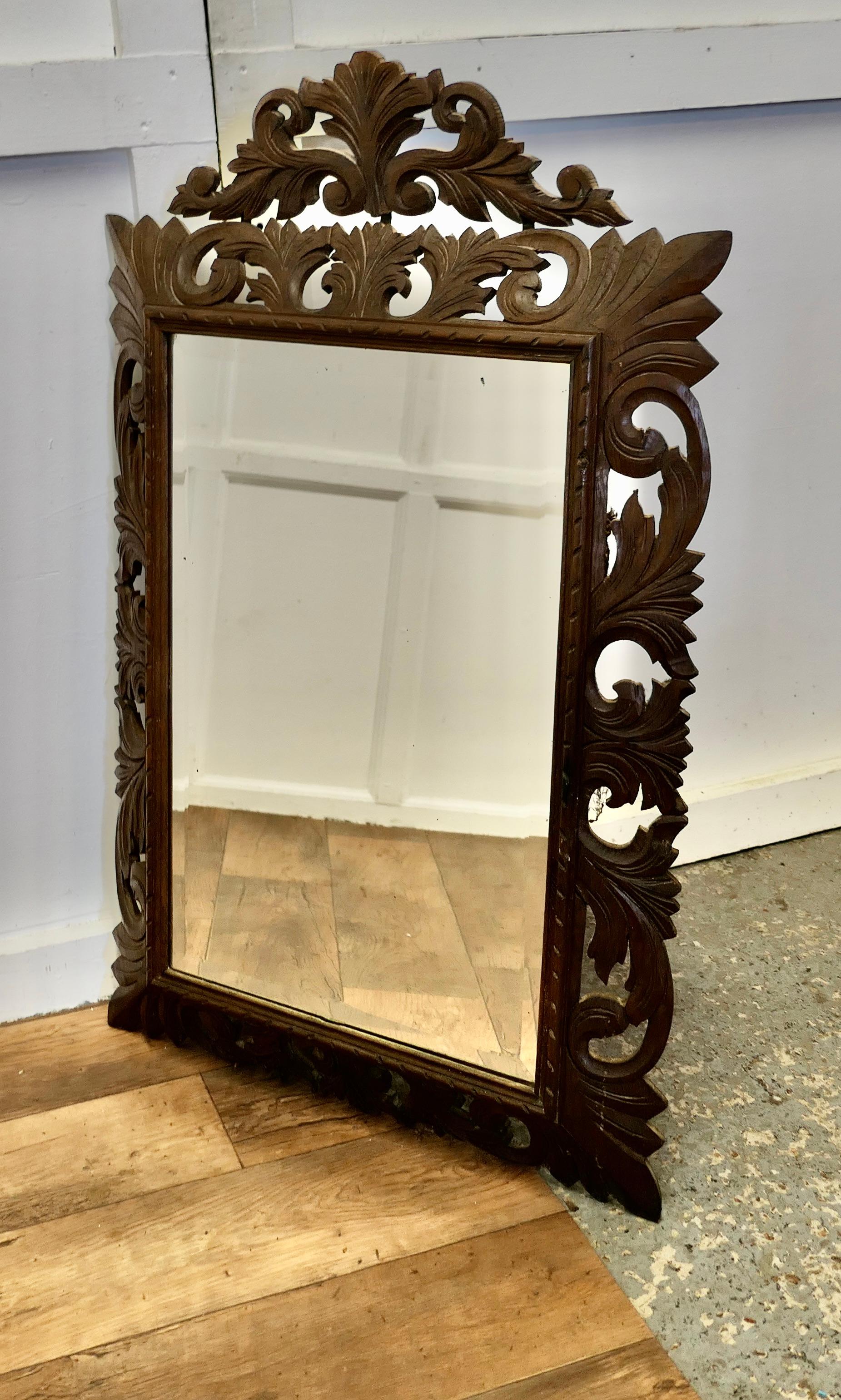 French Carved Gothic Oak Wall Mirror

The Oak Mirror Frame is Crisply Carved with acanthus leaves and a top crest, the Oak Frame is 5” wide and the carvings are in excellent condition
The Original Glass has very light foxing and is otherwise in good
