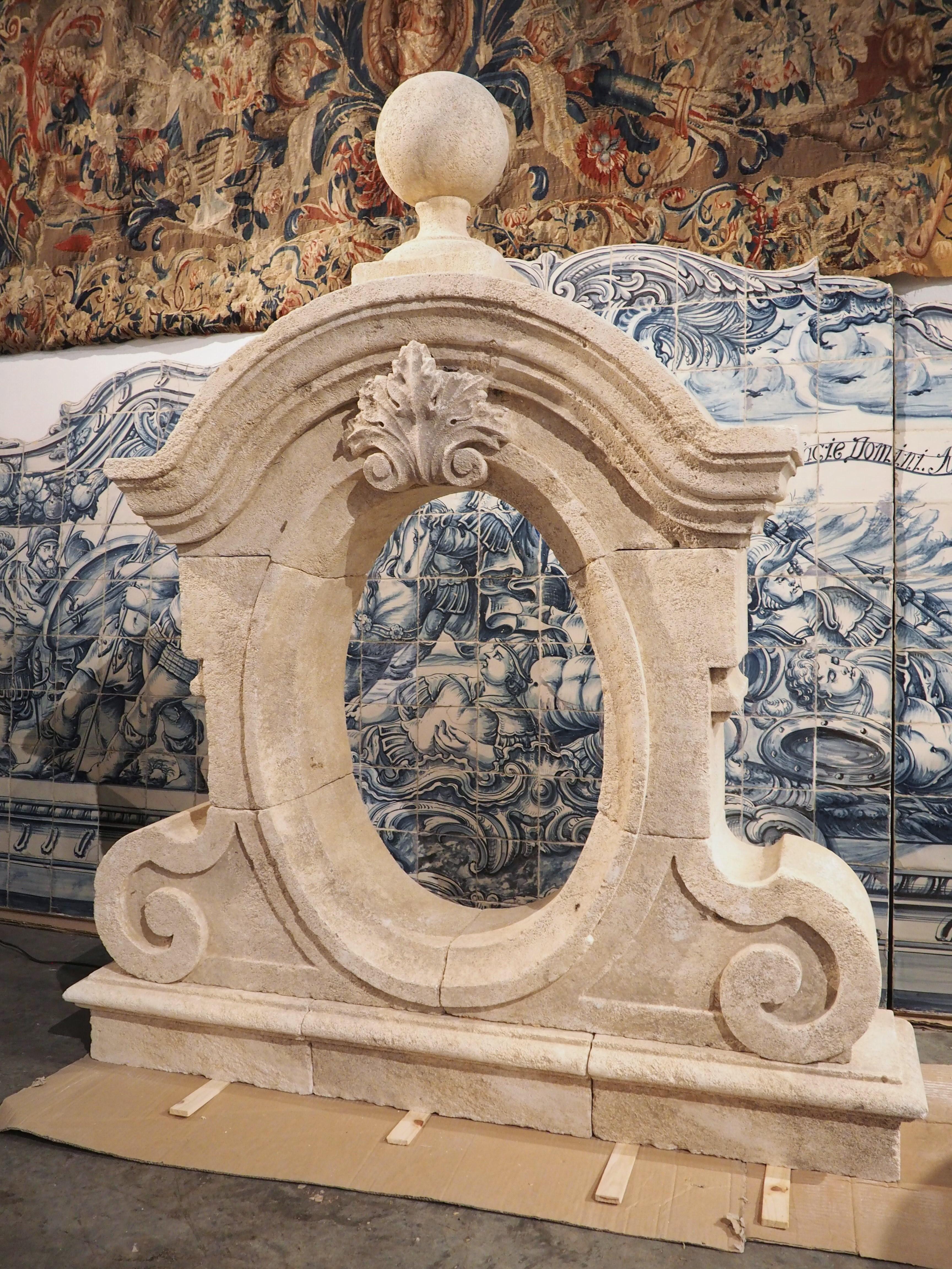 This lovely architectural element from Provence has several names: oeil-de-boeuf, chien-assis, dormer, and lucarne all of which are interchangeable. Comprised of nine pieces of limestone, the building component was designed to be installed on an