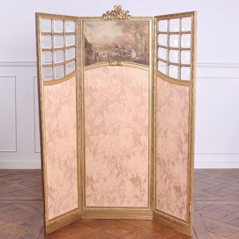 French carved Louis XVI-style three-panel screen, with bevelled glass upper panels and carved details. 

Measures: 45.5? wide x 1? deep x 58? tall.

 