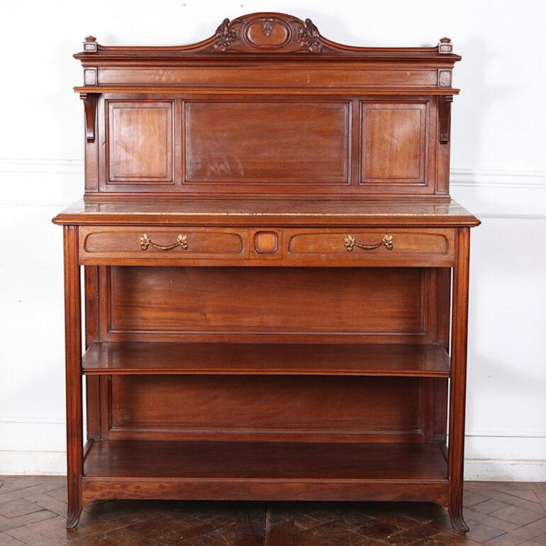 French carved mahogany ‘art nouveau’ influenced, three-tier server with marble-top. Two drawers with fine gilt bronze pulls and with a carved paneled back. C. 1900