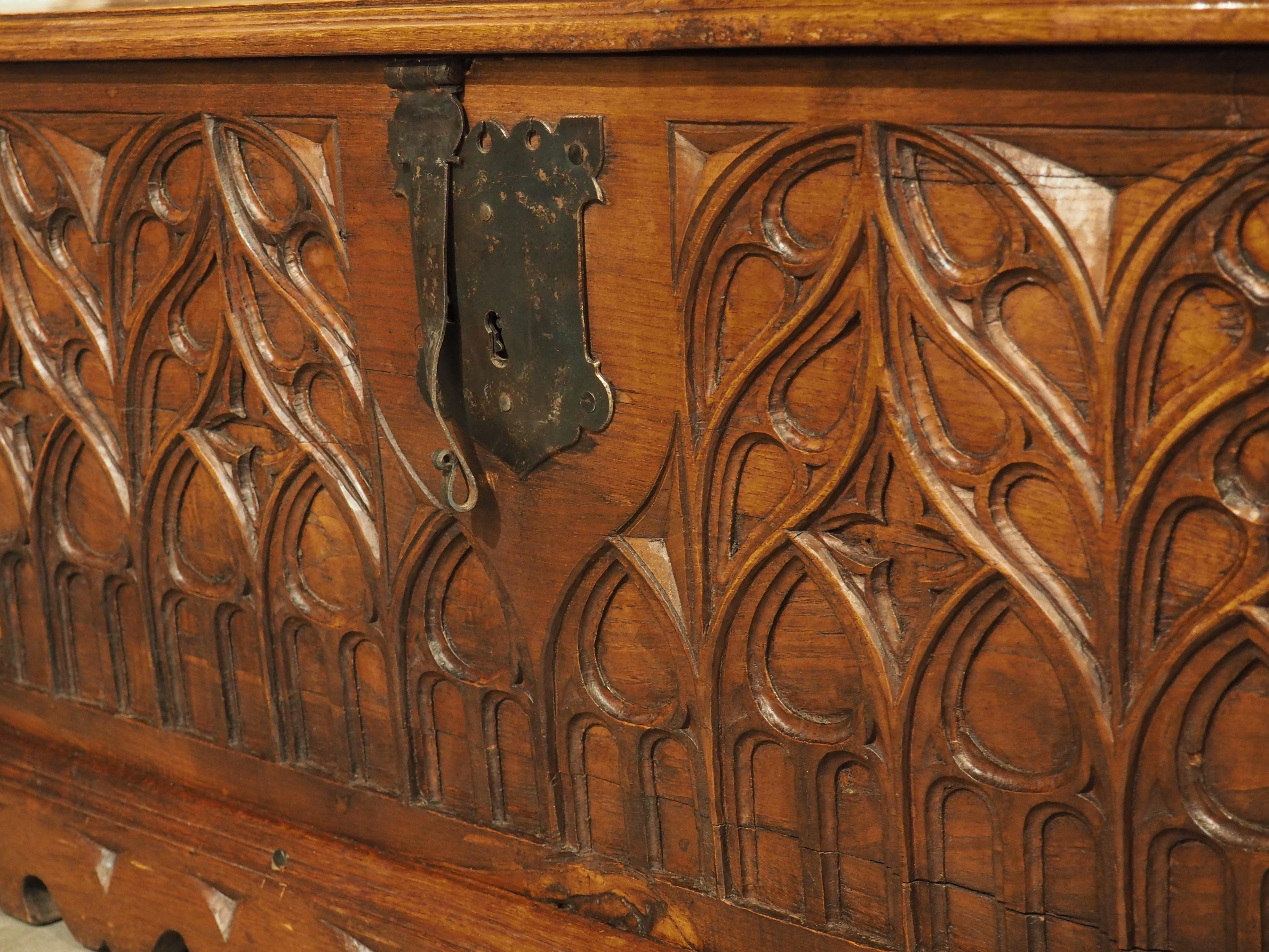 Although the term “Gothic” was originally intended to be used pejoratively, the term has come to describe the intricate latticework and high arches that defined architecture in Europe during the High and Late Middle Ages. Our French blanket chest or