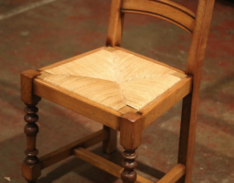 20th Century French Carved Oak Ladder Back Chairs with Rush Woven Seat, Set of Six For Sale
