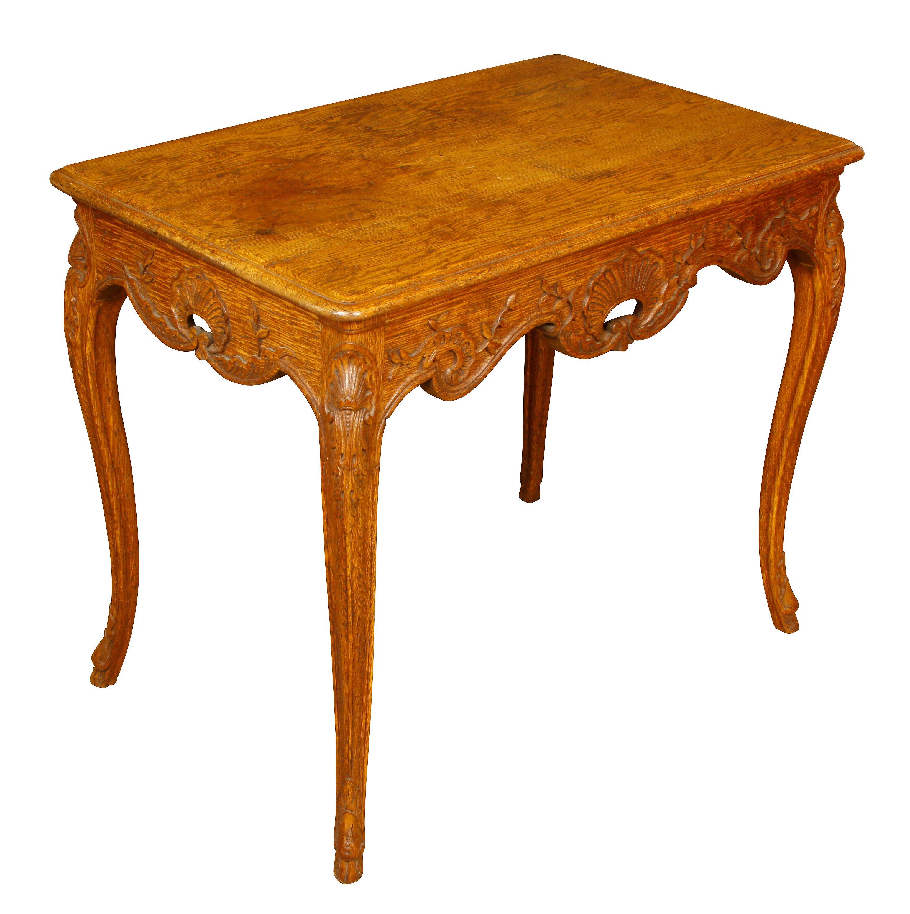French carved oak table with carved cabriole legs and carved apron front and sides