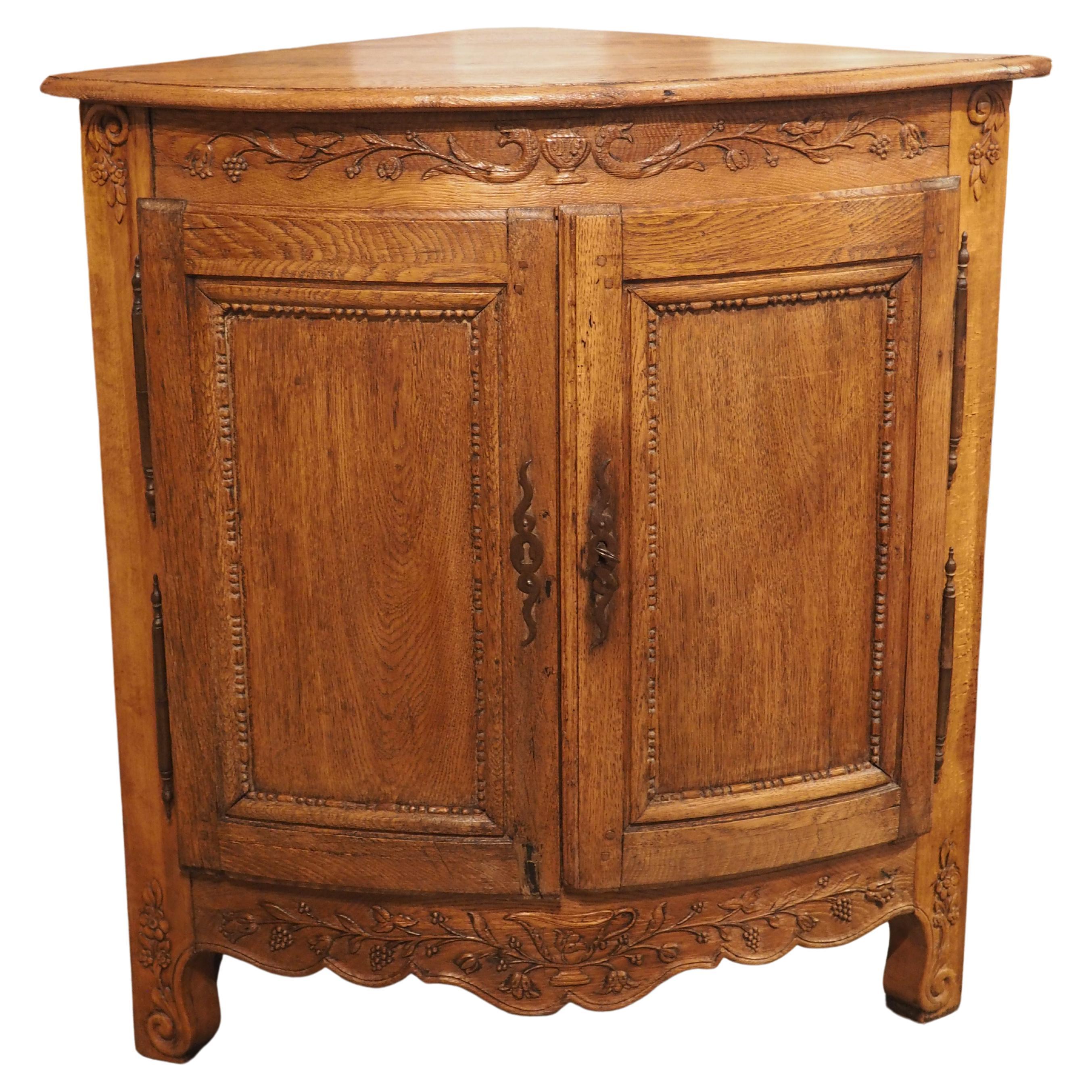 French Carved Oak Transitional Style Corner Cabinet, Circa 1780 For Sale