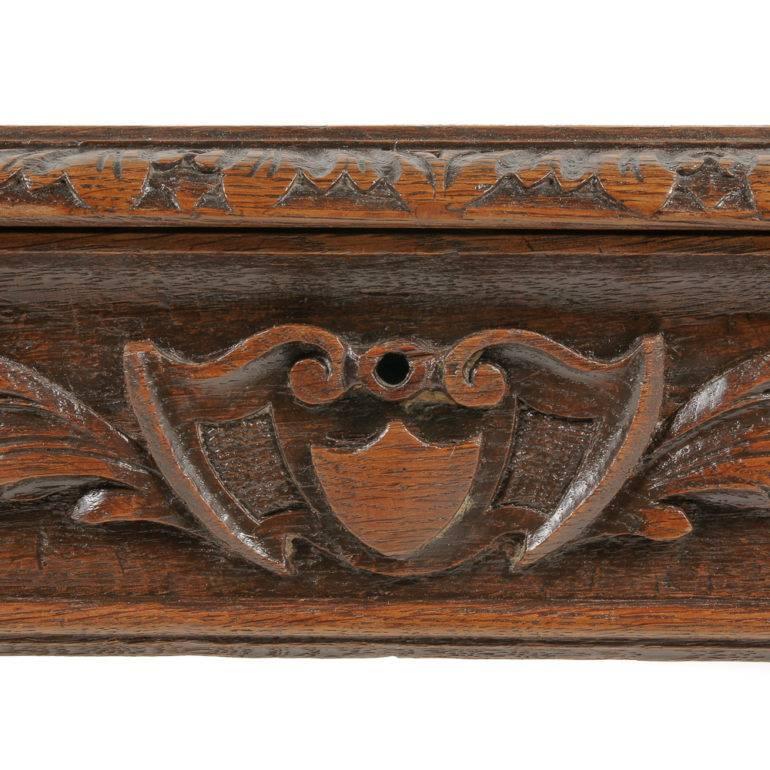 A smaller, carved oak, French Renaissance-Revival writing table with barley twist legs and a drawer, circa 1875.



    