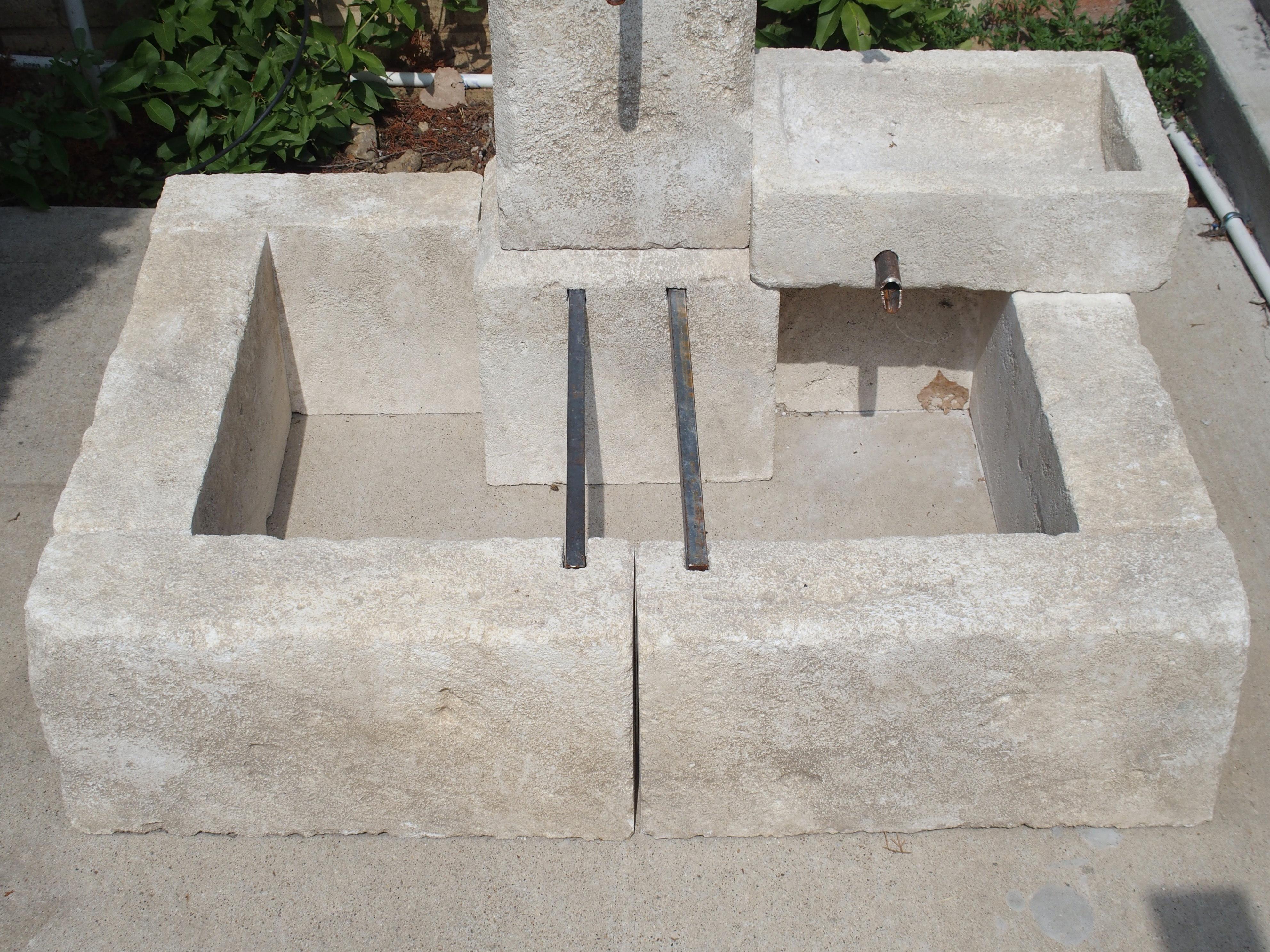 French Carved Single Pillar Limestone Fountain with Side Mounted Basin In Good Condition In Dallas, TX