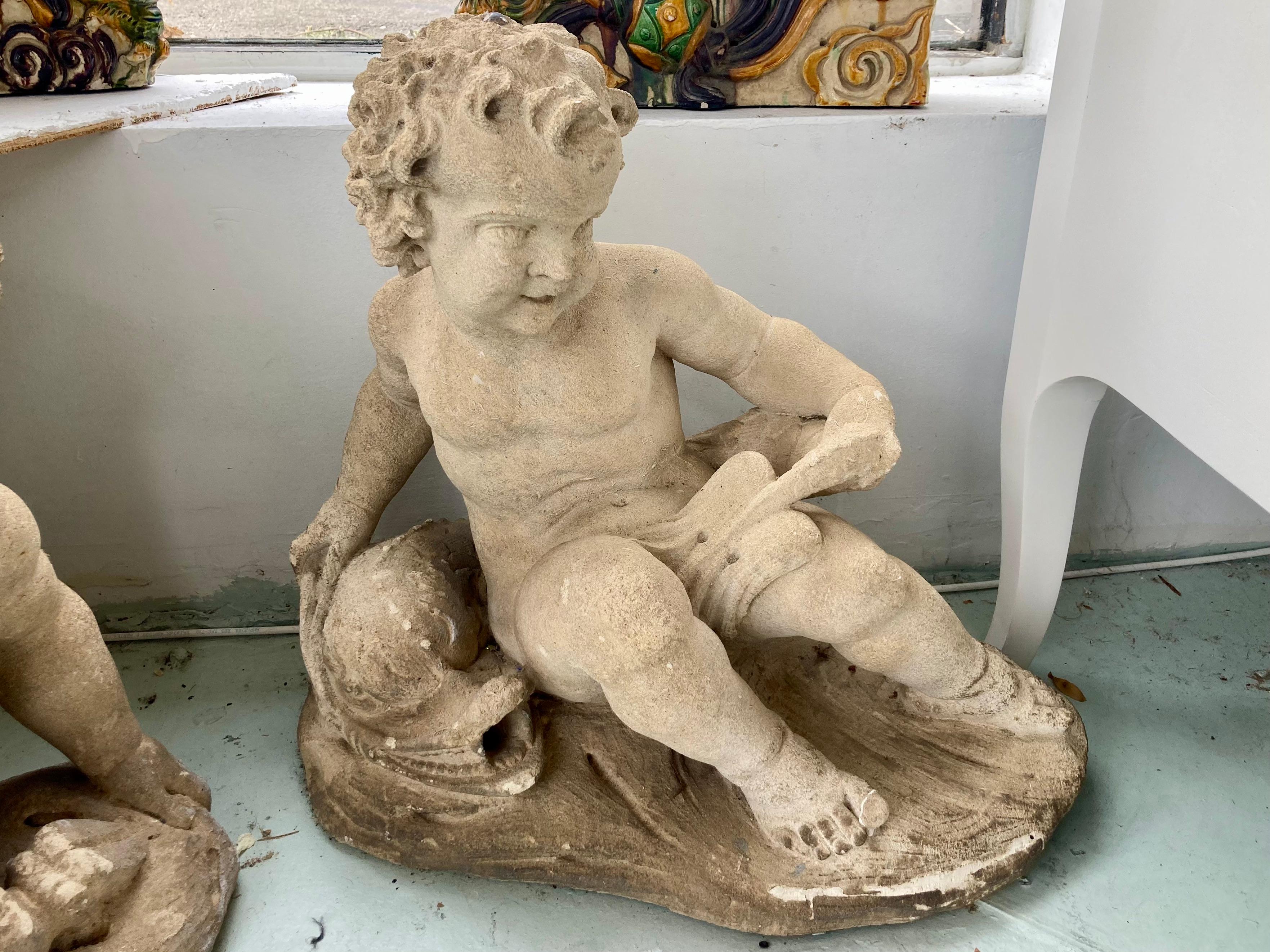 19th Century French Carved Stone Putti and Pan Garden Statues, a Pair For Sale