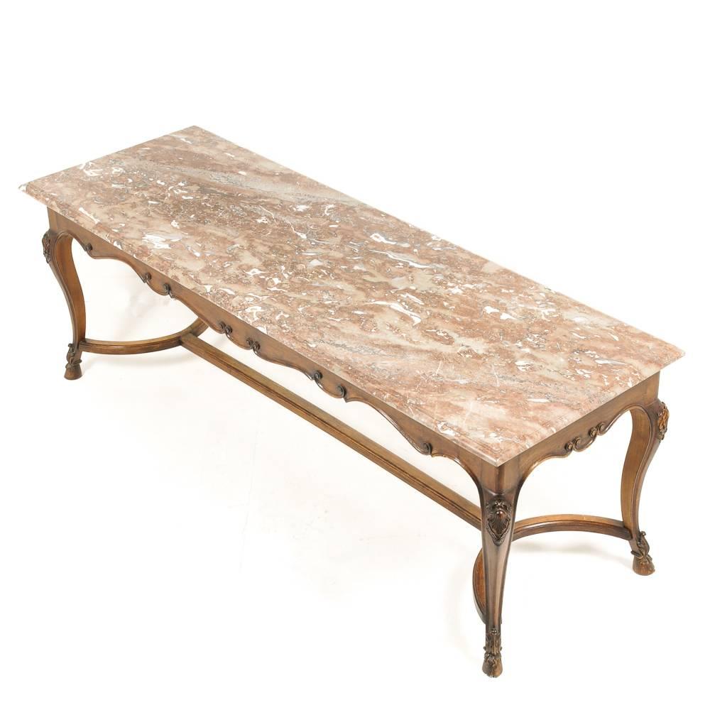 Superior quality walnut and marble topped Louis XV-style table from Paris, circa 1900.