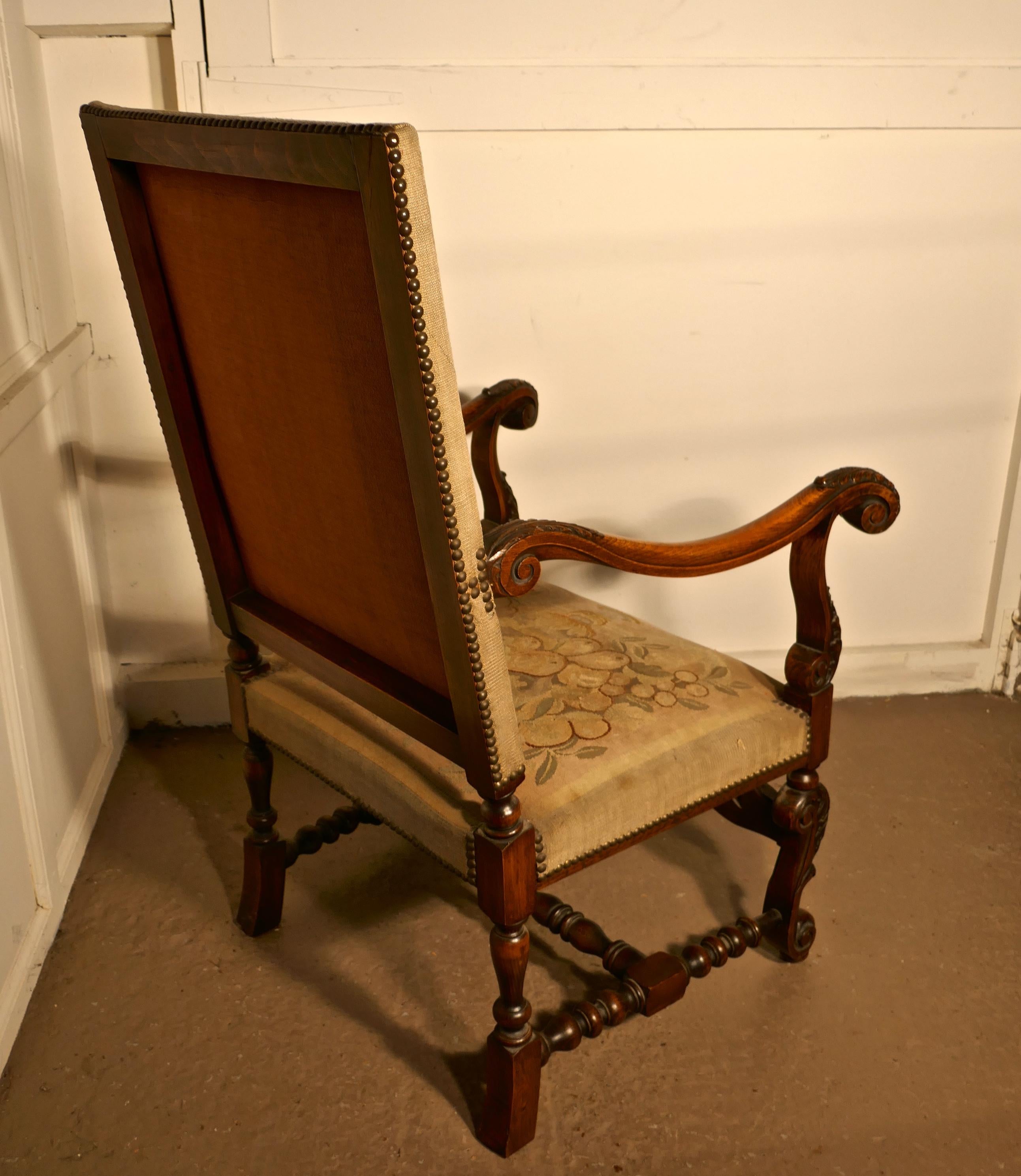 French carved walnut and tapestry library chair 

This beautiful carved walnut chair, it come with its own original petit point embroidered upholstery
The chair dates from circa 1880, the fabric is in muted colors with a central urn overflowing