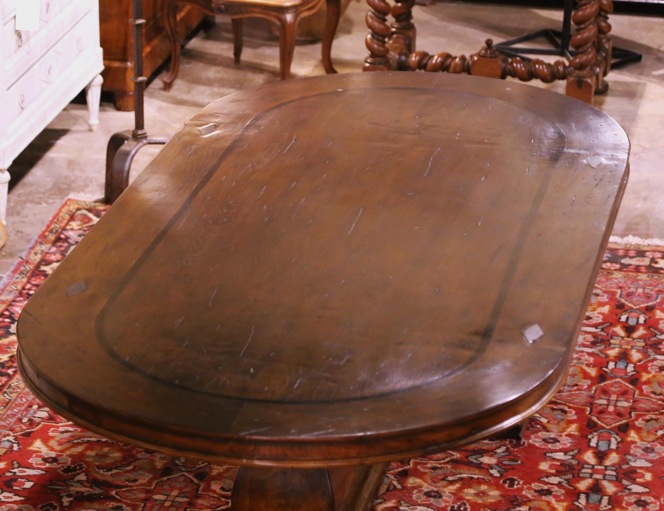 Louis XIII French Carved Walnut Oval Dining Table on Double-Pedestal Base