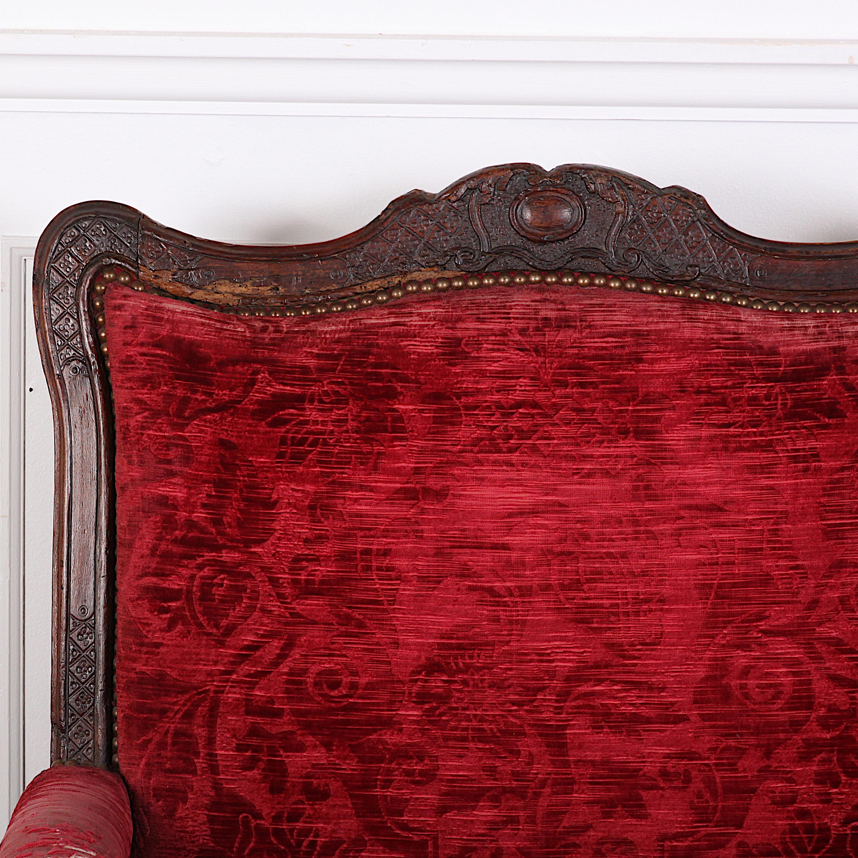French period Louis XV armchair, boldly formed and carved and a good comfortable size.