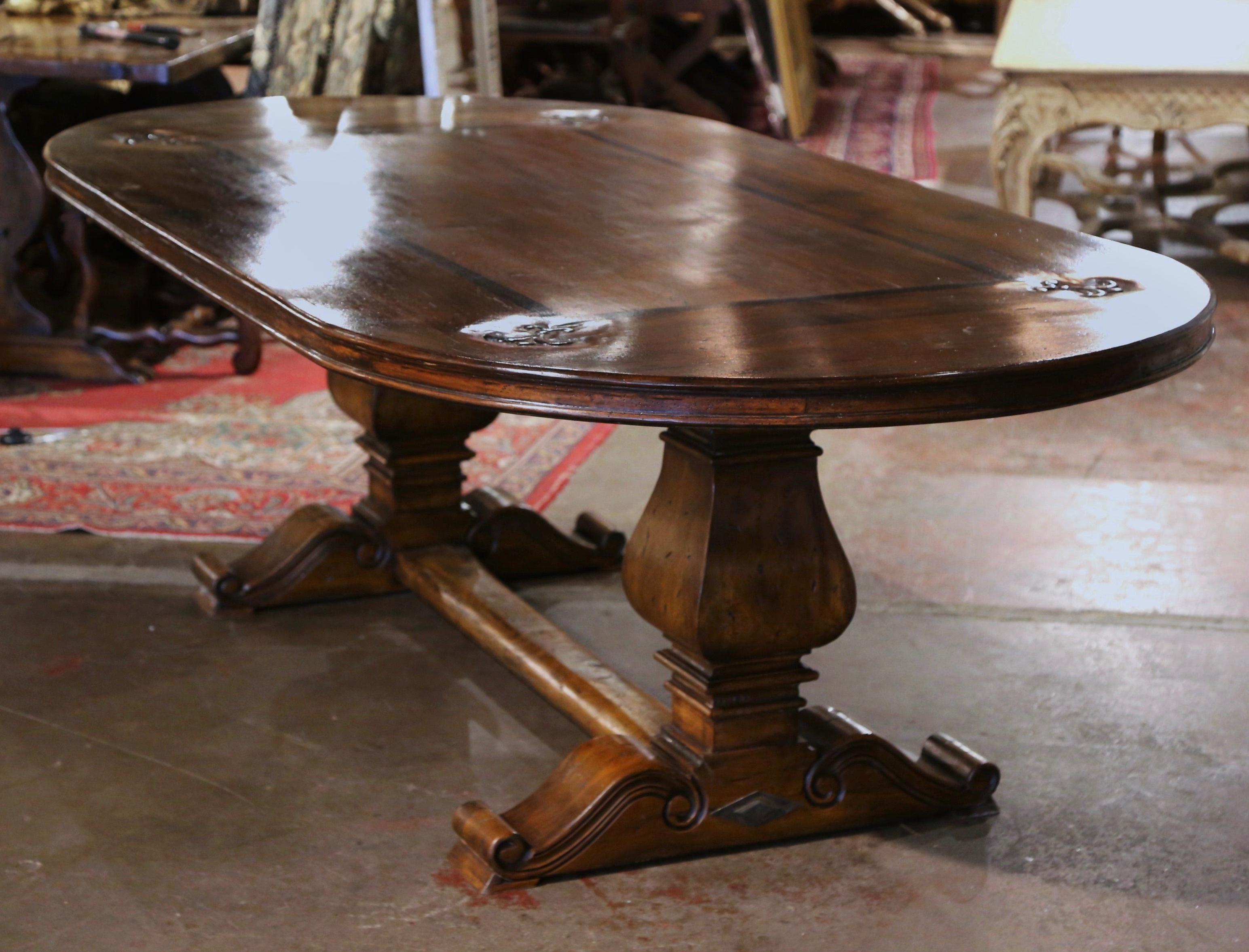 French Carved Walnut with Inlay Decor and Fleur-de-lys Trestle Dining Table In Excellent Condition For Sale In Dallas, TX