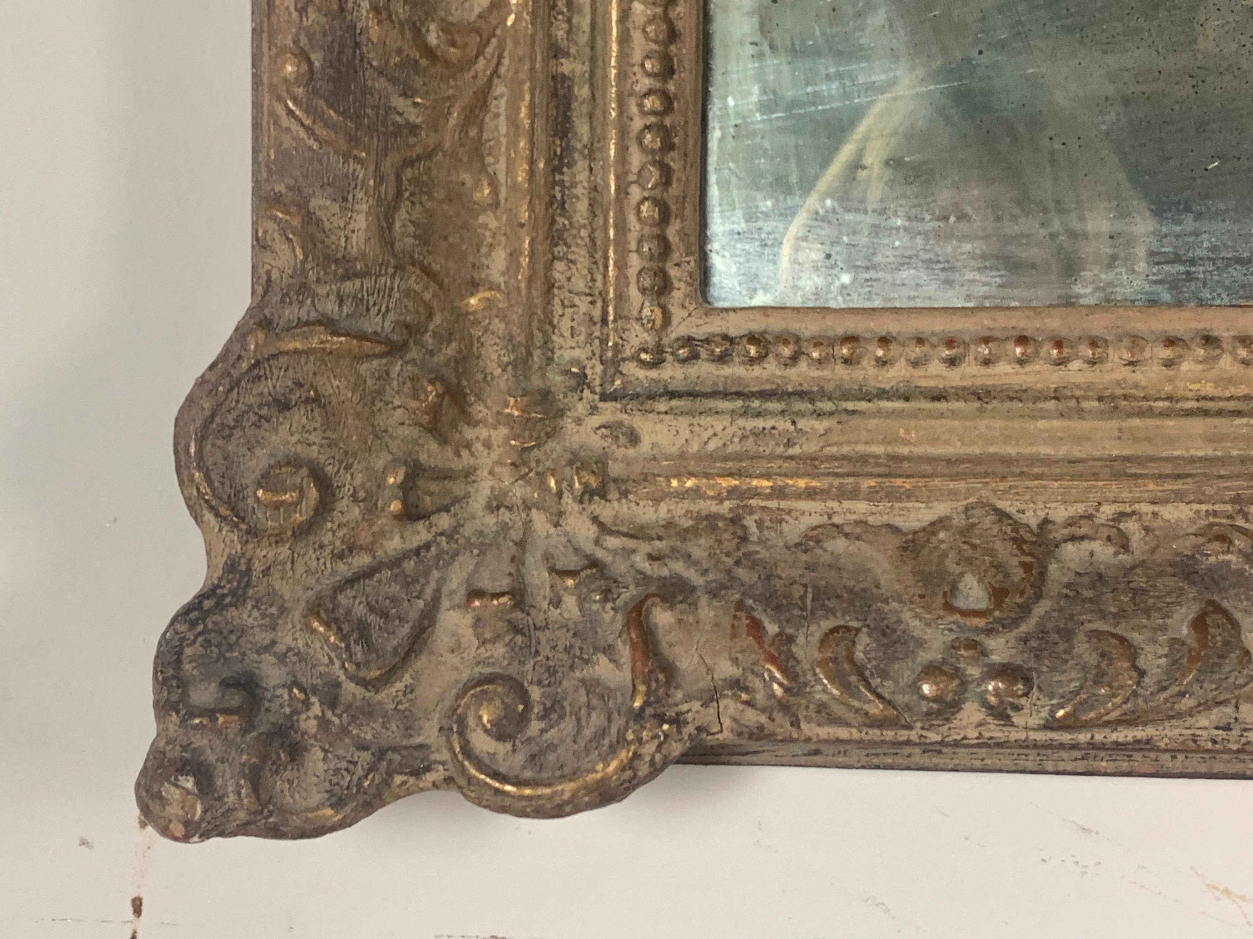 French wood & gesso rectangular shaped mirror with antiqued mirror inset.