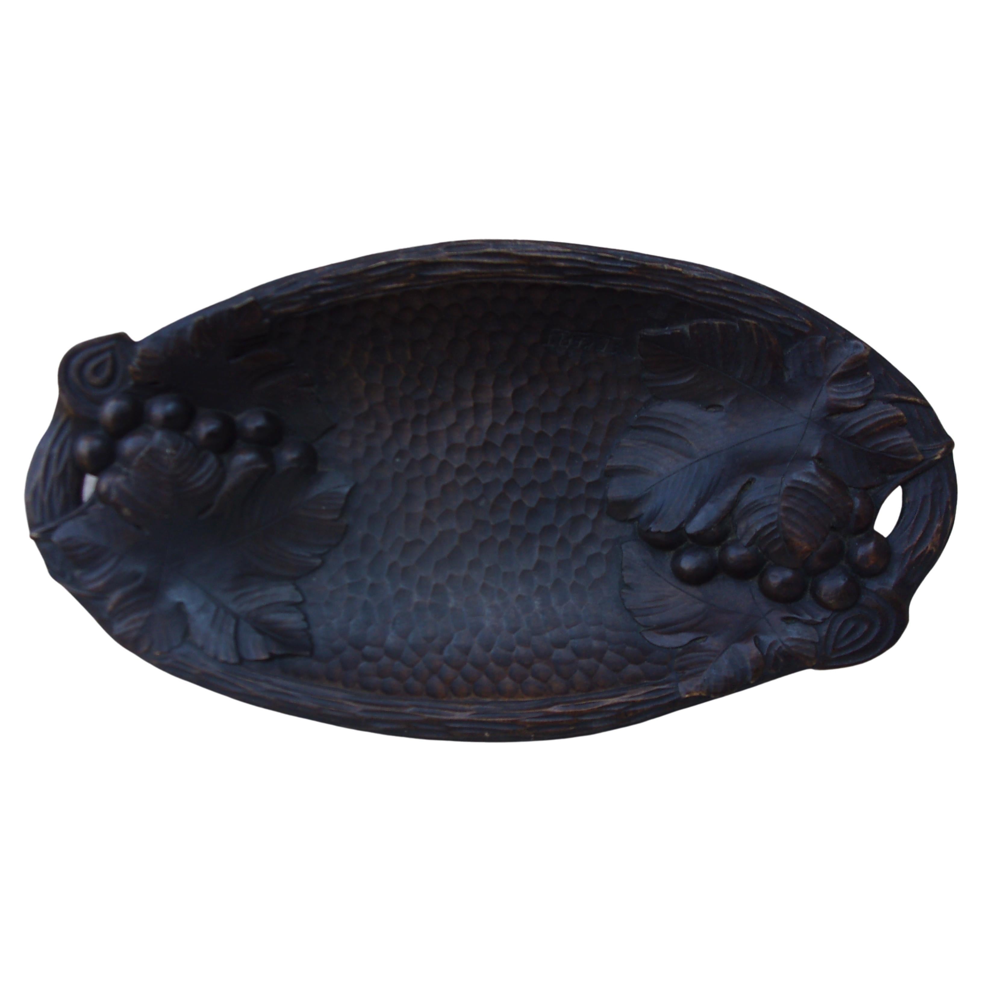 French carved wood bread or for fruits platter with grapes and vine leaves, circa 1900.