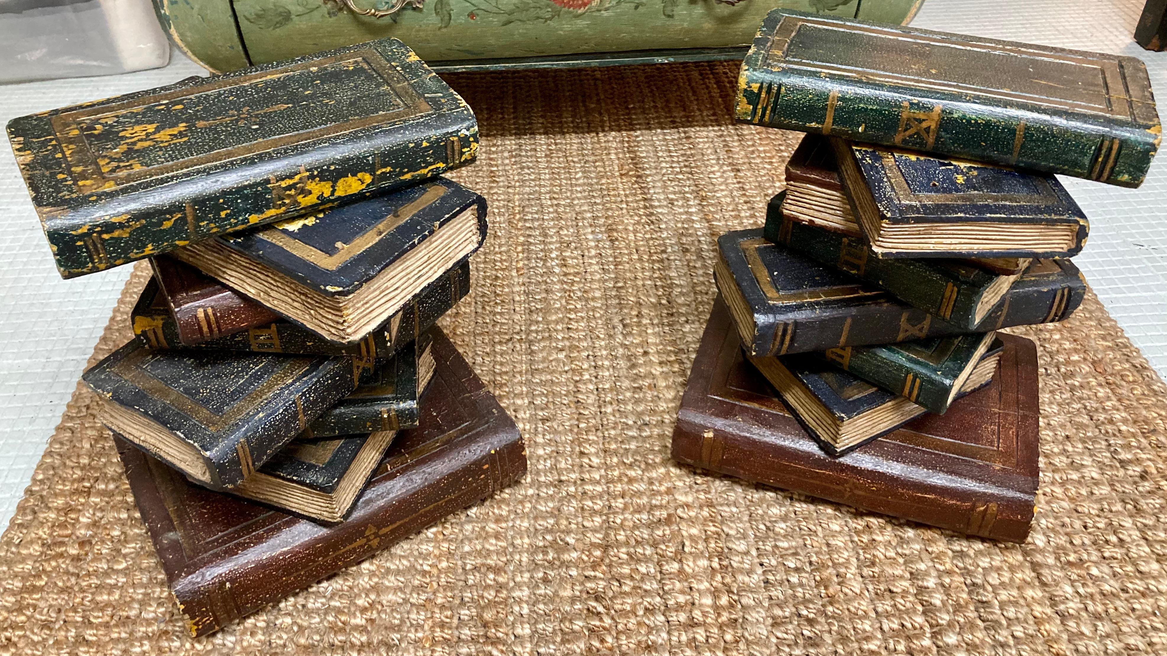 Beautiful pair of French carved wood stacked book cocktail tables. Great addition to your classical inspired interiors.