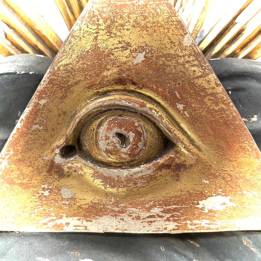 Antique French Wooden Carved Gilt All Seeing Eye, late 19th century. This piece features intricate wood carving with gilt detailing, showcasing the All Seeing Eye motif popular in the late 1800s. The eye symbolises wisdom and enlightenment. A rare