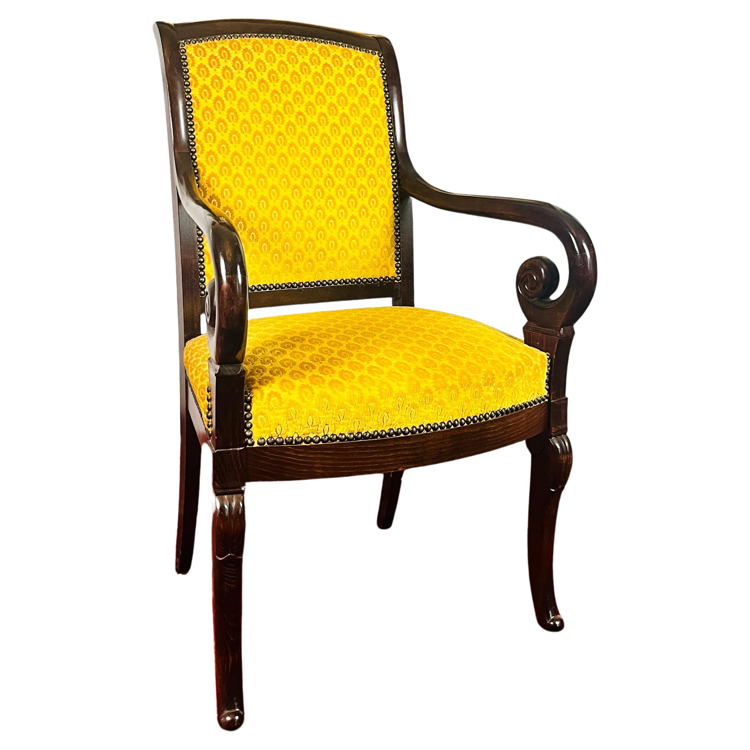 French Carved Wooden Armchair with Yellow Velvet   - Restoration Period - France For Sale
